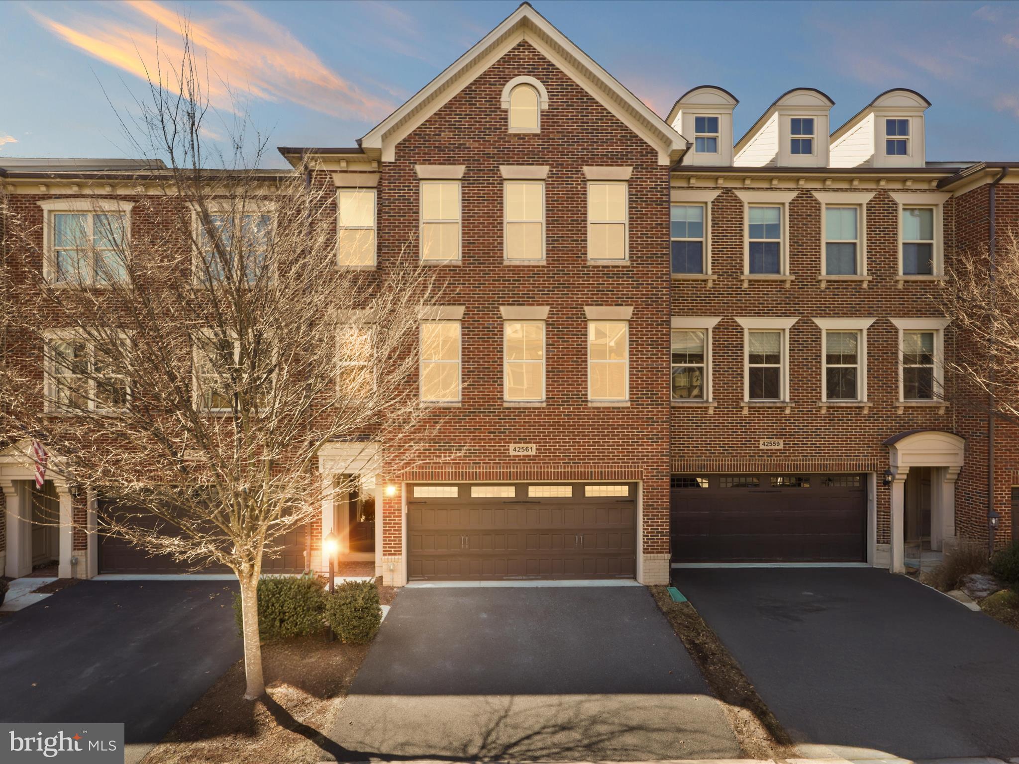 ***Multiple Offers Received , All offers due by Monday at 9:00pm***Welcome Home to 42561 Dreamweaver Dr, nestled in Brambleton VA. Best Value in town for a spectacular luxury 3 lvl Tripointe Town Home in heart of Brambleton with stunning interiors and an Upgraded elevation-Paxton model with Bricks. Premium“NORTH EAST” facing house**Move-in ready, Beautiful, Bright and almost 3300 sqft Model House**This home features open concept floor plan with 3 bedroom, 3.5 bath & front load 2 car garage**This gorgeous home is located in sought after “Brambelton” community **Upgrades galore:Freshly Painted, Fully upgraded Kitchen w/high-end cabinets , stainless steel appliances, Brand new refrigerator, Oversized kitchen island w/ counter area for prepping & seating. Stunning granite countertops, upgraded kitchen faucet & large sink,5-burner gas cooktop, microwave/oven combo, Commercial grade range hood which vents out**Stunning tiled backsplash**Off the Kitchen a Dramatic large composite wrap around Trex deck which is perfect for enjoying the summer breeze and hosting gatherings with friends.**Open concept large family room & dining room space on main level which is perfect for entertaining**Recess lighting in the thru-out the home, Pendant lights, stunning custom chandeliers & remote operated ceiling fans/with lights convey**House colors chosen and painted with the help of a professional interior designer, ensuring a cohesive and stylish look**Brand new Gleaming wide plank Luxury Vinyl floor on the entire Lowel level, foyer and entire upper lvl **Upgraded engineered floors on main level**superior high quality blinds thru out the home **Recess lighting in the living, kitchen & master **Pendant lights, chandelier Installed by designer add’s a touch of elegance and sophistication to living room floor**Huge master suite on upper lvl w/ tray ceiling which offers large walk-in closet and large master bath w/ standing roman shower, frameless shower door, soaking tub, floor to ceiling 12X12 ceramic tiles & linen closet, double vanity sinks , additionally there are 2 spacious bedrooms and one bathroom for two rooms. Laundry room is on Upper level **Rare main level room is perfect for work for home office or an in-lawsuit**Fully Fenced Back Yard overlooks open spaces and trees, giving you a wonderful park-like setting to enjoy year-round *Fully finished walkout basement with large rec room which is perfect for entertaining and a full bath. *Fully finished oversized 2 car garage, extra storage racks & upgraded garage doors ,Extra Long driveway** Community amenities include Stratford Landing Pool and Splash Park which is just around the corner as well as several other pools, community centers, club rooms, spas, you name it! If that isn't enough**HOA Fee Includes access to all Brambleton amenities and Verizon FIOS Package- Cable and Internet**Enjoy Outstanding Brambleton Amenities with Movie Theater, Restaurants, Shopping, Fitness Center and State-Of-The-Art Library across the Street*Premier Brambleton School Pyramid. Take advantage of all of the Brambleton amenities: Parks and recreation, 5 pool complex, sport courts/fields, library, adult and youth programs. Famed Hal and Bernie Hanson Park, Brambleton Town Center is minutes away: Dining, movies, coffee, groceries, doctors ,Gas station. Brambleton has 18 miles of paved trails, Tennis Cts w/ Lights, Sand Volleyball, annual events, art and farmers markets. Enjoy the lifestyle so close to home. EXCELLENT Commuter Location: Easy Access onto the Dulles Greenway & Toll Rd, Routes: 50, 15, 7, 28 W/5 miles of the Ashburn Silver Line Metro Within 9 miles of Dulles International Airport