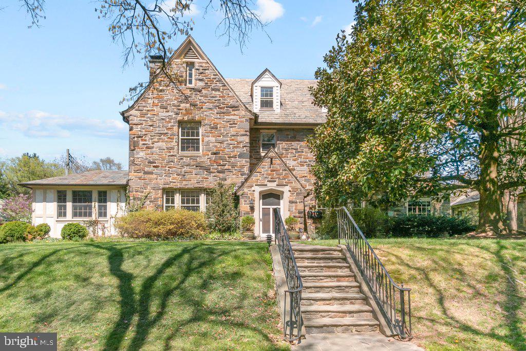 This classic 5-bedroom Guilford stone Colonial offers timeless character, generous proportions, and exceptional space for both everyday living and entertaining. The current owners, including New York Times best-selling illustrator Wallace West, have painstakingly removed dated wallpaper and carpet throughout the house to restore the natural beauty of this historic gem. A gracious entrance hall welcomes you into the home and opens to a stunning 24-foot living room featuring pegged wood floors, built-in bookcases, and a wood-burning fireplace. Opposite the living room, an elegant dining room has its own fireplace, built-in china cabinets, and wood flooring, with ample space to host dinner parties and other gatherings. The adjacent kitchen flows into a family room, perfect for casual dining and relaxing, and a small private space that can be used as an office or large pantry. There is endless potential to reconfigure, elevate, and expand these spaces to meet your needs. The main level also includes a half bathroom, sun-filled stone sunroom with updated windows, and a cozy study with built-ins and a fireplace.

Upstairs, the second level has two bedrooms that share a hall bath and a spacious primary bedroom with an en-suite bath. The third level boasts two more bedrooms and an updated full bath. The basement features an impressive 35’ x 15’ open, unfinished area with excellent potential for future finishing as additional living space, along with laundry and a half bath. Outside, the property is equally special. Gorgeous landscaping encircles the entire house, with a magnificent evergreen Magnolia tree anchoring the front yard. A stone patio and pergola at the rear creates the perfect private outdoor space to enjoy the tranquility of the surrounding garden. A two-car attached garage with high ceilings creates further potential for expansion to maximize the space. 

Ideally located within walking distance of Sherwood Gardens, Union Memorial Hospital, Johns Hopkins University, Loyola University, and Notre Dame of Maryland University, this home offers classic charm, abundant space, and an exceptional opportunity to live in one of Baltimore’s most sought-after neighborhoods. Seller is motivated. One-year home warranty included.
