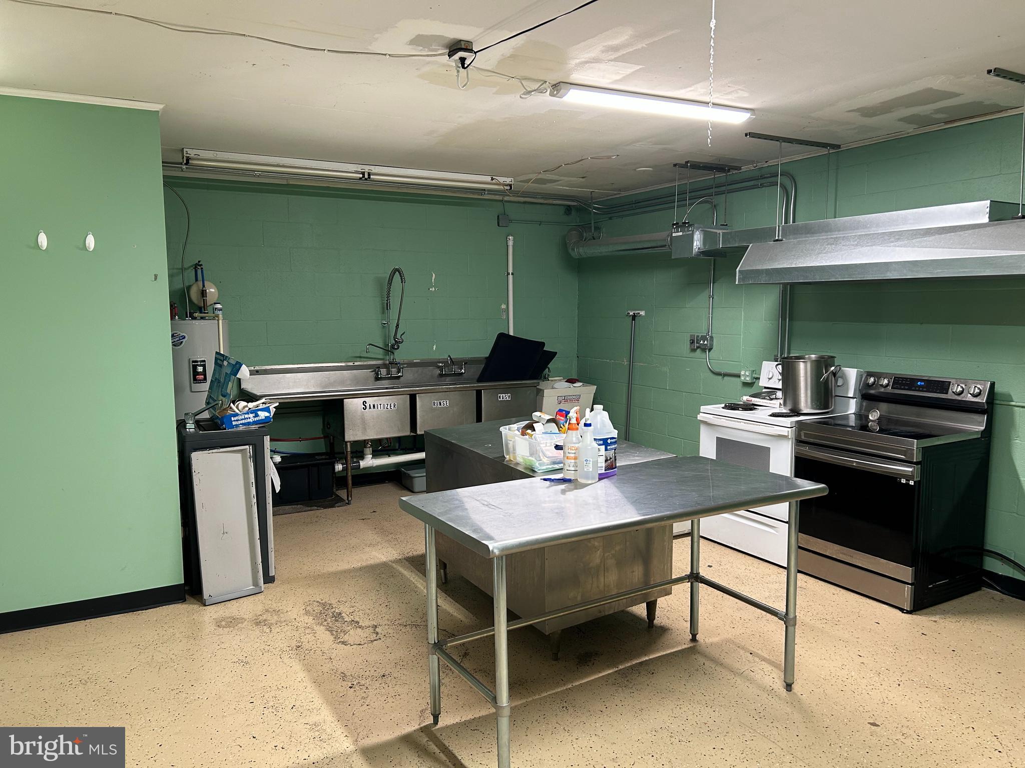Located in downtown Hanover, this “ghost” kitchen is in a convenient location for delivering all over Hanover. This kitchen is equipped with a large ‘light duty ‘ vent hood, and deep 3 bay stainless-steel sinks, a grease trap, and other kitchen equipment.  

This semi-commercial kitchen was built to work as a turnkey solution for catering owners to expand their business quickly and affordably. The space features a large open kitchen area, a private bathroom and an additional large room for storage, bookkeeping or just relaxing. 

The space is  1700 SF and is nicely equipped with mini-split for heating/cooling in the break room area, lights on timers and low maintenance flooring. There is one parking space included in rent.

Due to its business presence and residential communities, Hanover is an up-and-coming food delivery market for this area. The space is located in the rear of a commercial building, making it ideal for food preparation to deliver.