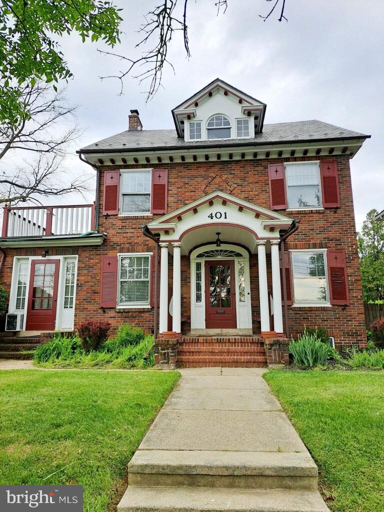 Several ways to use this versatile corner property with lovely curb appeal in the Heart of Shillington—a home that blends timeless charm with rare versatility.   Dynamic property with endless possibilities! Use the entire home as your private residence, live in the main house while generating income from the basement apartment, or take advantage of the limited commercial zoning by operating your business from the private office space. Investors can also appreciate the opportunity to rent both units for maximum income potential.  The moment you arrive you are greeted by the historic brick facade, accented by classic shutters, graceful columns, and dual balconies, sets the tone for the character found throughout. The main home welcomes you with a light-filled, eat-in kitchen featuring white cabinetry, generous counter space, and tile flooring. Original hardwood floors continue through the formal dining room and into the spacious living room, where a beautifully detailed brick gas fireplace creates a warm and inviting centerpiece. French doors lead to a bright home office with its own separate exterior entrance, offering an ideal setup for a small business or private workspace. The charm continues upstairs with four comfortable bedrooms and a full bath, while the fully remodeled walk-up attic offers a stunning additional bedroom with soaring 11-foot ceilings, new lighting, new carpeting, refinished hardwood floors, and abundant natural light—an unexpected retreat tucked beneath dramatic roof lines. Multiple heating sources, including gas radiant heat, mini-splits, and the gas fireplace, ensure year-round comfort. Outside, a private stone courtyard provides an inviting space forgathering, relaxing, or entertaining. Beyond the courtyard sits the spacious brick two-car detached garage with a private driveway. The property also includes a separate three-bedroom, one-bath rear apartment, complete with its own kitchen and living area—perfect for rental income, extended family, or limited commercial use permitted by zoning. Recently updated with all new LVP flooring, new doors, and fresh paint throughout. All of this is located just a short walk to the community pool, local parks, shopping, and schools, with right across from sought after Governor Mifflin High School, making this home a rare combination of space, charm, convenience, and income-producing potential. A truly one-of-a-kind opportunity in the heart of Shillington.   For investors looking to add this property to your investment portfolio; main home recently rented for $2,200 per month, the lower-level apartment for$1,400 and finally the office space separately projected at $900 per month, and detached garage rent for$300-$400 per month. Included in the sale is the lighted double-sided sign for business that reaches a high daily traffic count. Seller is a PA Licensed Realtor.