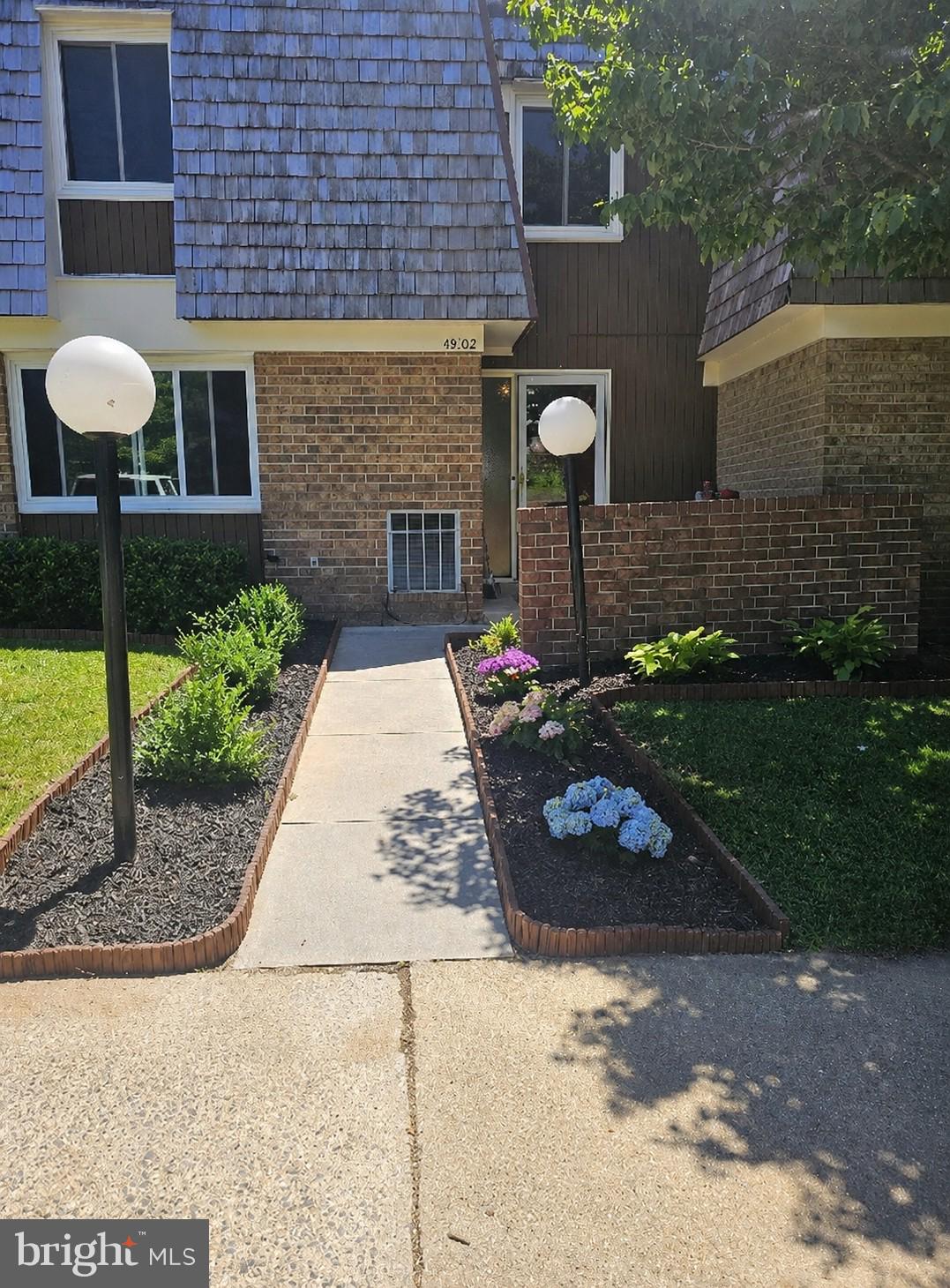 ***Price Reduced***This beautifully updated and meticulously maintained townhome offers an exceptional blend of modern style and everyday comfort. Spanning over 2,200 square feet of finished living space, this residence is presented in absolute move-in condition, offering a sophisticated lifestyle at an accessible price point.
<br>
<br>
Inviting Main Level
<br>
From the moment you step into the wide entry hallway, the quality of craftsmanship is evident. The foyer features elegant ceramic tile and warm hardwoods, leading past a spacious walk-in coat closet and a discreetly positioned powder room.
<br>
<br>
The heart of the home is the Chef-Inspired kitchen, featuring:
- Sleek granite countertops and a custom tile backsplash.
- Brand-new stainless steel appliances.
- Plentiful cabinetry and a functional breakfast bar.
- A seamless pass-through to the dining area, perfect for hosting.
<br>
<br>
Throughout the home, the attention to detail is remarkable, highlighted by crown and chair rail moldings, recessed lighting, and energy-efficient newer windows.
<br>
<br>
Restful Upper Level
<br>
The upper floor serves as a true retreat. The Primary Suite is a sanctuary of comfort, complete with a generous walk-in closet. Two additional sizable bedrooms—each featuring double closets—share a bright, modern bathroom equipped with a double-sink vanity, providing plenty of space for family or guests.
<br>
<br>
Versatile Lower Level
<br>
The fully finished basement expands your living options significantly, offering:
- A large, cozy family room for movie nights.
- A dedicated home office space.
- A full third bathroom for added convenience.
- A substantial utility and storage room with laundry hook-ups.

Outdoor Living & Amenities
<br>
<br>
Step outside to your private patio and backyard, an ideal canvas for gardening or summer BBQs. Two assigned parking spaces are located just steps from your front door for ultimate ease.
<br>
<br>
Living here means enjoying the unparalleled lifestyle of Montgomery Village. You’ll have access to an incredible array of community perks, including:
<br>
- 7 sparkling pools and professional tennis courts.
- Winding walking trails, lush parks, and playgrounds.
-Proximity to a fantastic public library, diverse shopping, and local dining.
<br>
You will want to make this your forever home!