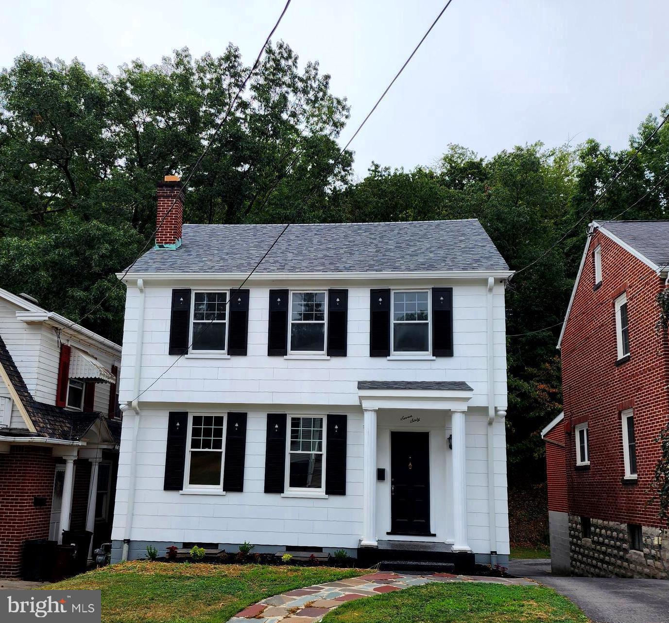 This fully renovated historic gem, nestled in the charming Historic West Side of Cumberland and Mountain Side, Maryland,  Built in 1936, it seamlessly blends vintage character with modern upgrades, including a new roof,  a new fresh kitchen, and beautifully refinished floors throughout.  The home features 3 bedrooms, 1.5 baths, and a full basement with ample storage space. Enjoy the convenience of central air, gas heat, and replacement windows. A screened porch provides a perfect spot to relax, while the walk-up attic offers additional storage options. With a garage, off-street parking, and all appliances included, this property is move-in ready.  Don't miss the chance to make this charming residence your own—schedule your tour today!