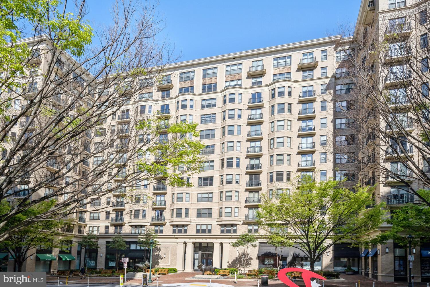Welcome to the epitome of luxury condo living in downtown Bethesda at the Lionsgate.  Step inside the welcoming foyer of this wonderful two-bedroom + den, two-bathroom unit offering 1,773 square feet and a terrific floor plan.  The gourmet kitchen offers a huge center island perfect for dining, food prep, and barstool seating.  The Viking appliance package includes double ovens which makes entertaining a breeze.  There’s a butler’s pantry and ample space for a large dining room table.  Enjoy the spacious living room with custom built-ins and professional design touches throughout.  An abundance of windows and a Juliet balcony complement this space. 

Retreat to the bedroom corridor and find a lovely primary suite complete with another balcony, two custom outfitted walk-in closets, and an en-suite bath featuring a large shower and separate soaking tub.  There’s a second bedroom and a second full bathroom, excellent for guests.  Need a private workspace? The den/home office offers the perfect setup for this, providing dedicated space without having to compromise a bedroom or other common area.  You’ll also find a laundry room with full-size washer and dryer, and additional storage closets throughout the unit.


This full-service community has so much to offer including valet parking, friendly doormen, 24/7 concierge, a party room, a library, and a well-equipped fitness center.  There’s a spectacular rooftop terrace with grand views of the city, and amazing space for relaxing or entertaining with tables, lounge areas, barbeque grills, and more.  Unit #501 comes complete with THREE parking spaces, separately deeded (one single, plus one tandem), and an additional storage unit, too.  Located just two blocks from the Bethesda Metro, with easy access to Bethesda Row, the Capital Crescent Trail, and countless shopping, theater, and dining options.  This is the perfect place to call home!