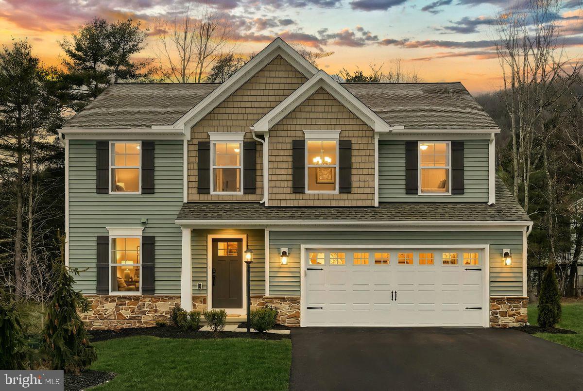 Don't wait. For a limited time, our 2-1 Buydown saves you nearly $10,000* in payments in years one and two. Use our preferred lender and title company to qualify. Talk to your Sales Agent today.

Welcome to Homesite 52 at The Seasons — a Move-In Ready Black Cherry that delivers an exceptional level of finish from the moment you arrive. Crisp white siding, deep granite shake accents, manufactured cobblestone to the sill, and a carriage-style garage door with decorative glass create a streetscape presence that's hard to miss.

Step inside and the thoughtful design continues. The flex room is finished as a study — perfect for working from home or quiet reading. The expanded morning room opens the main living area in a way that changes how the space feels, and the alternate kitchen layout takes full advantage of it, featuring upgraded white laminate cabinetry with matte black Gibson hardware, Steel Gray polished granite counters, a gloss gray tile backsplash, matte black faucet, and stainless gas appliances. Kitchen island pendants and recessed lighting in both the kitchen and family room round out an interior that feels both functional and elevated.

Upstairs, the primary suite includes a double bowl vanity package with 72" raised-height cabinetry, Carrara Marmi quartz tops, and a 60" sliding framed shower door in matte black — a true retreat without compromise. Both full baths carry the same cohesive upgraded cabinetry and quartz vanity top. Throughout the home, matte black hardware ties every room together, from door knobs to vanity lights to the square baluster stair railing stained in True Black.

Outside, a 10'×12' composite deck with steps to grade makes the morning room addition even more livable. The basement is unfinished with a bath rough-in — ready for your future vision. A garage door opener with wireless keypad adds everyday convenience.

Taxes based on land only. Photos may show options/upgrades. 10-Year Home Warranty included. Photos and renderings may include options and upgrades not in the list price and may have been enhanced or virtually staged. Subdivision assessment is pending; taxes will be based on the improved lot and home.