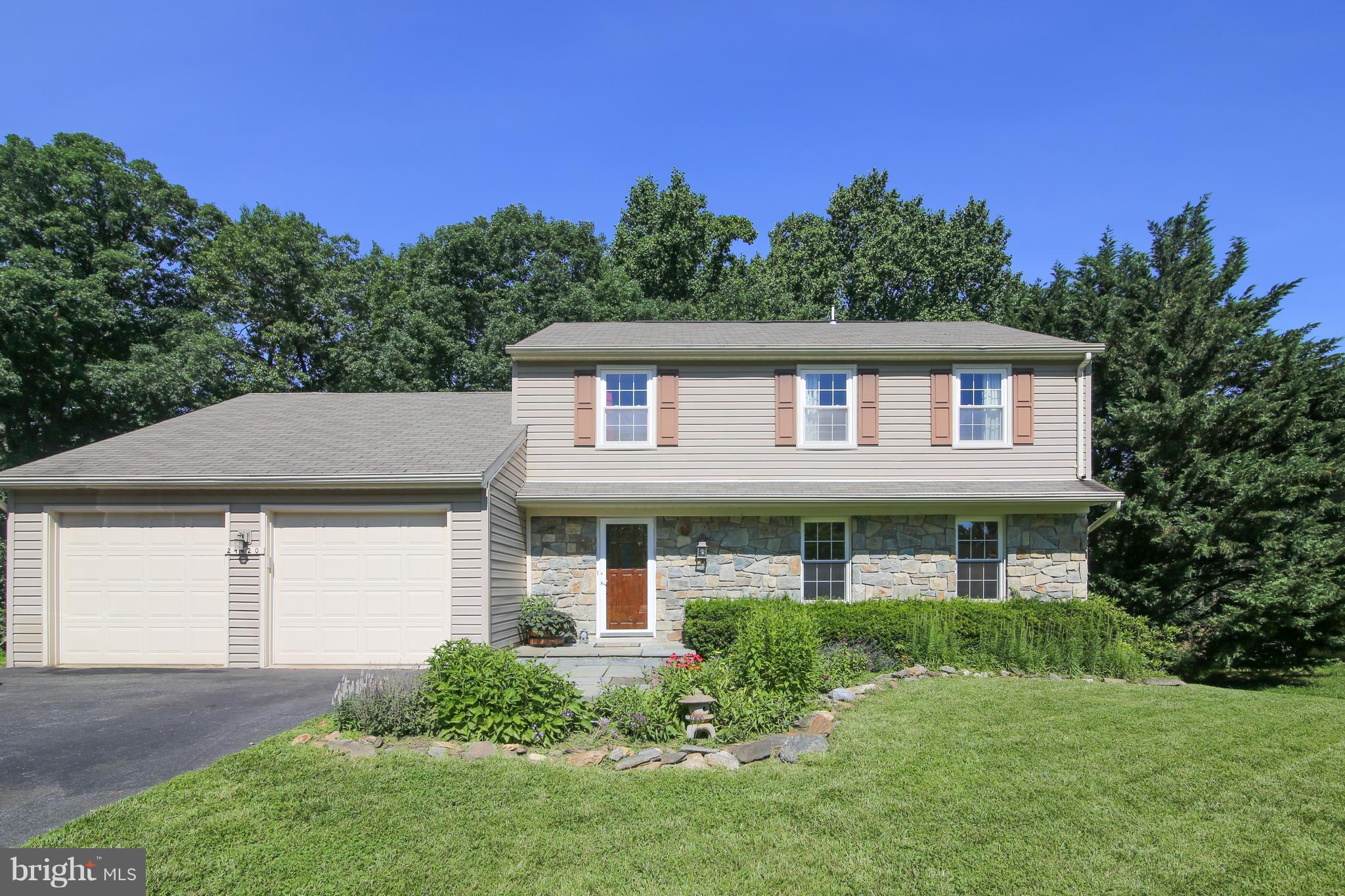 Exceptional 4 bdrm,2.5 bath colonial,situated on a private lot that backs to trees.The home features a huge addition with a vaulted ceiling & a true 4-season sunroom,leading to a deck overlooking wooded green space. Inside boasts hrdwd flrs & new carpet on the main level.Enjoy 4 spacious bdrms upstairs including a master bedroom w/full bath.The unfinished, walk-out basement offers tons of storage.