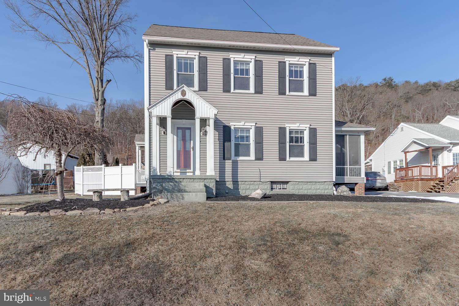 A stately 2-story in Lock Haven! This well-maintained 4 bedroom + an office, 1.5 bath home radiates charm and is sure to please the pickiest buyer. Once inside, you will appreciate the massive living room, attractive dining room, and impressive kitchen with stainless steel appliances, granite countertops, tile backsplash, and plenty of counter + cabinet space. The first-floor primary bedroom boasts over 225 square feet, a private entrance to the secluded backyard, and a convenient half bathroom. The 2nd floor delivers 2 sizeable bedrooms, an office (or large closet), and a stunning full bathroom with a tile shower + rainfall showerhead. Retreat to the finished 3rd floor where you will find a 4th bedroom – this space can also be used as a rec room or private office space. As the we approach spring, you will love the secluded, outdoor oasis with a brick patio, fenced-in yard, in-ground pool, and cute Gazebo. Additional highlights include a detached, 2-story garage with covered parking for two, and a screened-in side porch to enjoy those warm summer nights that are just around the corner. Conveniently located 5 minutes to downtown Lock Haven + Lock Haven University, 30 minutes to Williamsport + Pennsylvania College of Technology (Penn Tech), 35 minutes to downtown Bellefonte, and 45 minutes to downtown State College + Penn State campus.
