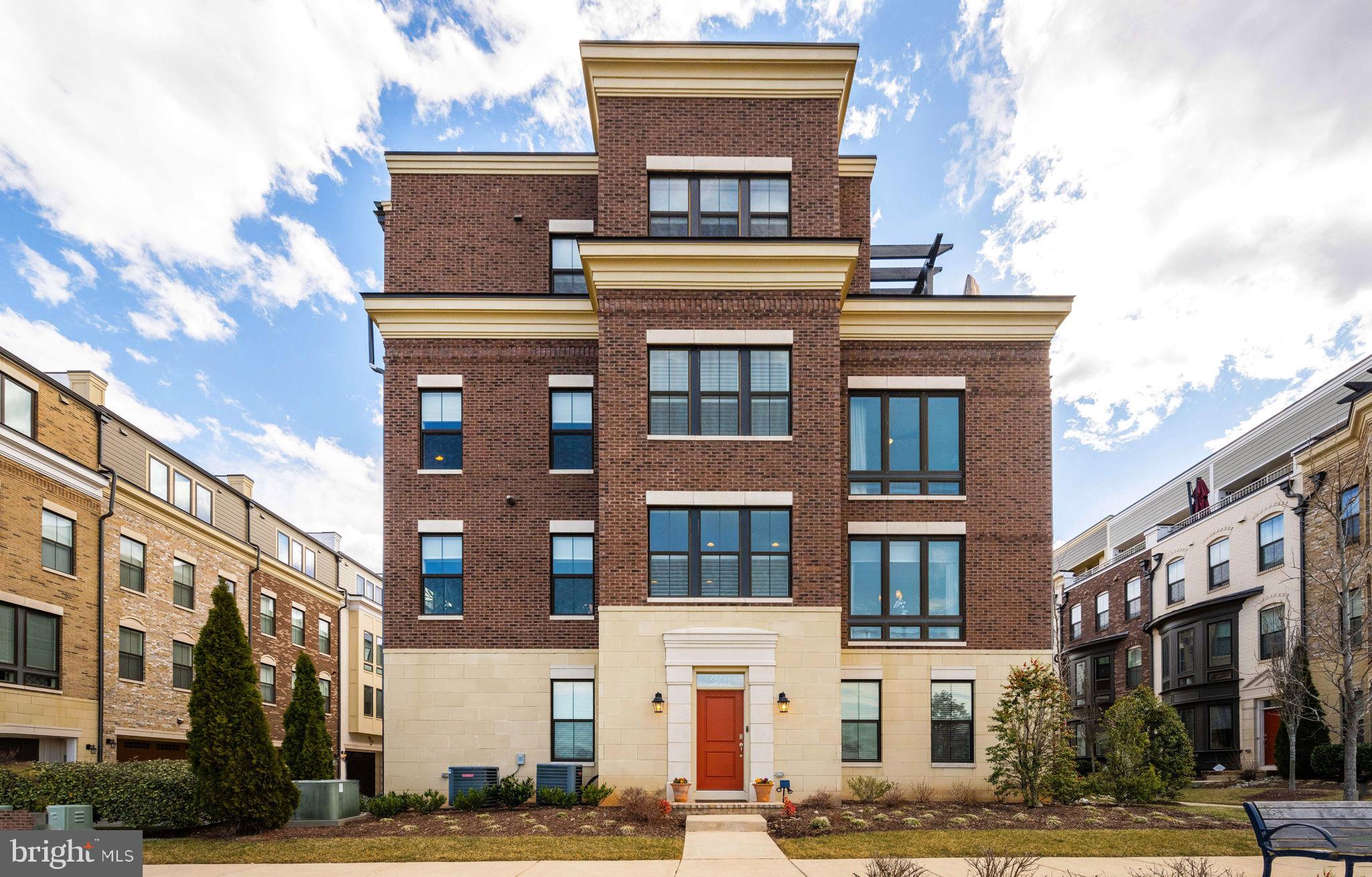 Rare one-of-a-kind end townhome situated high above National Harbor offers unparalleled panoramic views of the Potomac River, Alexandria, DC, and MGM Hotel and Casino from all four levels. Floor-to-ceiling windows on three sides bathe the home with natural light throughout the day, while the private rooftop terrace is the perfect spot to enjoy stunning sunsets and dazzling fireworks displays over National Harbor, DC and Alexandria during the holidays. Whether you're sipping coffee in the morning or hosting friends under the stars, this home delivers an unforgettable backdrop for everyday life. 

Designed for modern lifestyles, you’ll love the open-concept floor plan, 9-foot ceilings, 5” wide wood plank flooring throughout, and fully outfitted gourmet kitchen with double oven, gas cooking, and a huge granite island that comfortably seats six. The living and dining areas connect seamlessly, anchored by a cozy sitting nook with built-in units—perfect for displaying books, barware, or treasured decor—offering a front-row seat to the best views in the community. The living room’s gas fireplace alongside a custom built-in cabinet offers a warm ambiance on cool evenings, and the home’s excellent sound insulation and high-quality windows ensure a peaceful living environment.

The primary suite is a private retreat with a walk-in closet and luxurious bath, featuring an oversized shower with dual shower heads as well as dual vanities. You'll also appreciate the laundry located on this level, with even more storage and folding space on the adjacent built-in bench and storage area. Just like the secondary bedroom on this level, each of the four bedrooms has its own en-suite bathroom, providing privacy and comfort.

The fourth-level loft is a true showstopper, featuring an exercise area, full wet bar with wine cooler, full-sized refrigerator, and an indoor-outdoor fireplace. This level also includes the third bedroom with en-suite bathroom and walk-in closet, making it an ideal guest room or office. The rooftop terrace provides picturesque views, including a direct line to the Washington Monument, and quickly transforms into a private outdoor escape with retractable sun screen shades.

On the entry level, an enclosed flex space with en-suite bathroom can serve as a secondary home office, fourth bedroom, or media room. And the two-car attached garage includes custom built-in shelving for additional storage.

Located in the world-class gated community of Potomac Overlook of National Harbor, this home offers not only luxury living but also an unparalleled level of convenience and peace of mind with private security patrol and an easy app-based access system. The homeowners association also provides full-service lawn care, underground sprinkler system, and leaf and snow removal.

Residents enjoy exclusive perks such as $1/day parking in all National Harbor garages and open parking lots, a resident discount card for dining and shopping, and access to walking trails along the Potomac River. Two private back exits and a separate road wraps around to the Potomac Overlook community keeping you out of traffic on event days and makes daily commutes and outings hassle-free.

National Harbor Marina is within walking distance with rentable boats, kayaks, and a boat club. And if you're a pet owner, you'll appreciate the three nearby dog parks within the community offering a welcoming space for furry friends. Potomac Water Taxi provides a fun and effortless way to travel to Old Town Alexandria, The Wharf, Mt. Vernon Estate, Georgetown, and Nationals Park. And for commuters, this home provides quick and easy access to DC, even during rush hour, making it ideal for those who need seamless connectivity to the city. Total square footage is per tax records.