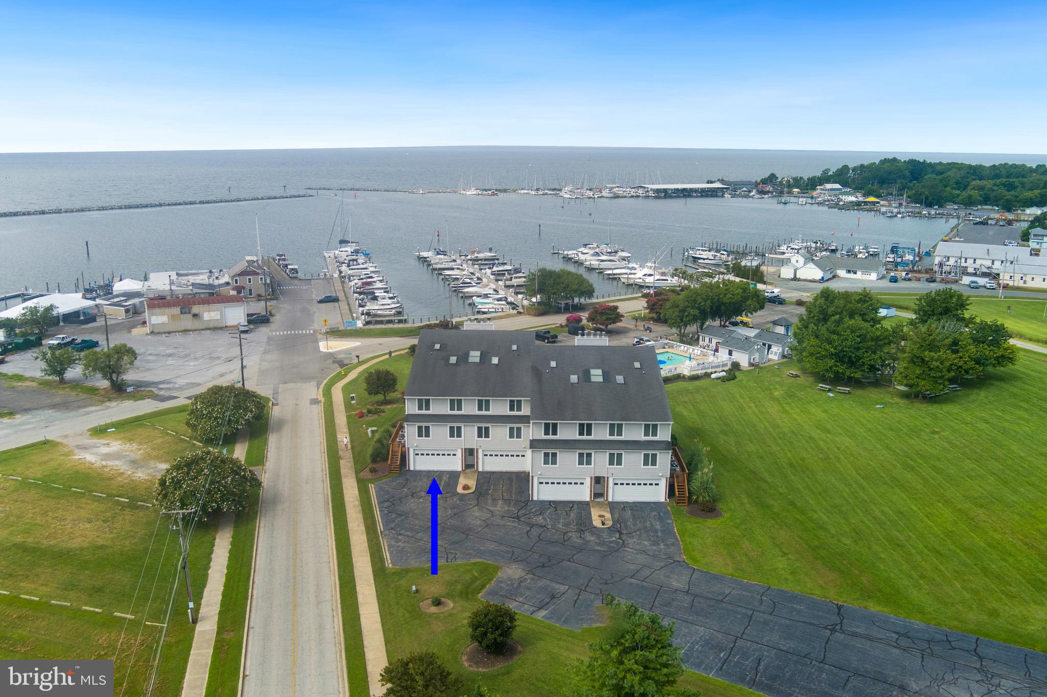 Back on the market. Spectacular Chesapeake Bay waterview condo located in the heart of Rock Hall.  Beautiful upgrades include LVP flooring, tile bathrooms, kitchen cabinets, backsplash, granite countertops and appliances, plus new electric fireplace. Relax on the recently refinished Bayview deck or cuddle up next to the fireplace. The convenience of condo living lets you enjoy all the festivals and fun Rock Hall has to offer without the maintenance headaches.  This unit has been used as a high quality short term rental for more than a year.
