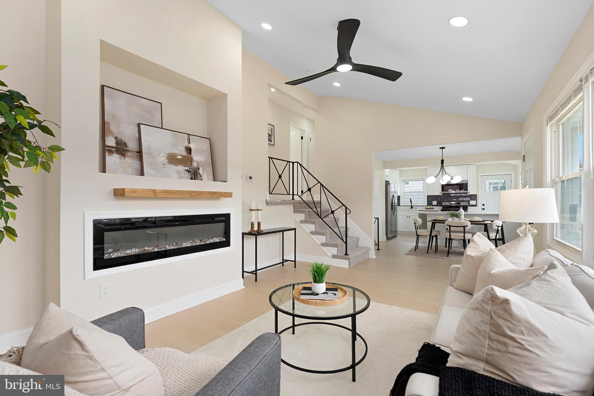 Welcome home to 5011 Old Court rd! This updated home boasts an array of modern finishes, featuring 3 bedrooms and 2 bathrooms. Step inside, and you'll be greeted with the open-concept main living area flooded with natural light and soaring ceilings. The spacious living room offers a sleek fireplace and flows seamlessly into the dining area and kitchen, creating an ideal layout for everyday living and entertaining. The kitchen includes a center island with seating, ample cabinet space, new quartz counters, tile back-splash and stainless steel appliances. Your upper-level features 3 bedrooms and 1 full bathroom with modern high-end finishes. The fully finished lower level offers an additional full bathroom and can be used as a family room, home gym, or extra space for guests - and also has a private separate entry. Conveniently located near and with easy access to 695, 795 and I-70. And let's not forget about the sizable backyard and driveway!