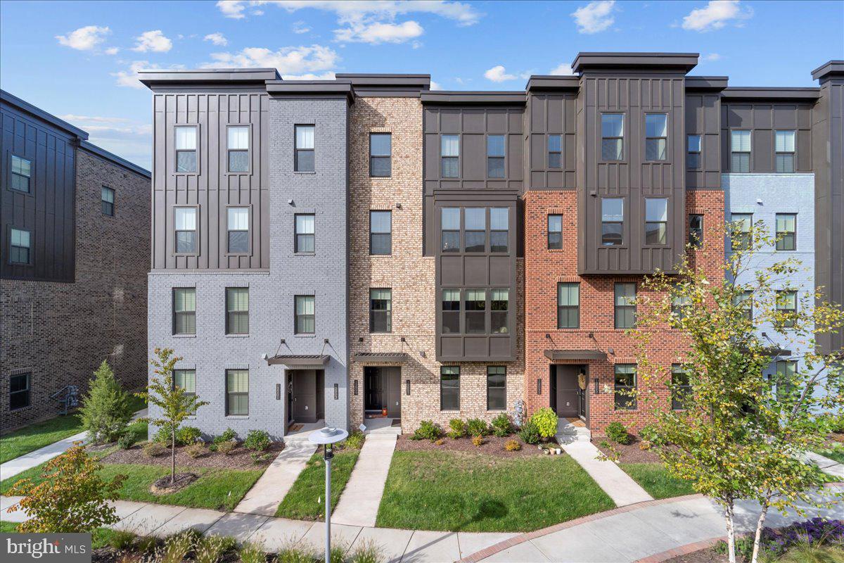 Welcome to your DREAM HOME! This gorgeous, nearly new brick-front townhouse is perfectly located just minutes from HERNDON METRO, AMAZON HQ, SHOPPING, DINING, top-rated schools, and MAJOR ROUTES - UNDER 1 MILE FROM METRO,  including the Dulles Toll Road—making your commute and errands a breeze!

Step inside to find a BRIGHT, SPACIOUS HOME filled with DESIGNER FINISHES throughout. The fully equipped GOURMET KITCHEN features CONTEMPORARY CABINETS, QUARTZ COUNTERTOPS, a FARMHOUSE SINK, PULL OUT TRAYS, USB charging ports, and STAINLESS STELL APPLIANCES—perfect for cooking and entertaining. Enjoy the convenience of a smart NEST THERMOSTAT, RECESSED LIGHTING, LUXURY VINYL PLANK FLOORS, and stunning WOODEN OAK STAIRS .

Retreat upstairs to your tranquil master suite with TWO CUSTOM WALK-IN CLOSETS and a SPA LIKE bathroom boasting a dual vanity and frameless shower. Two ADDITIONAL bedrooms with CUSTOM CLOSETS, a FULL DESIGNER BATH, a PRIVATE BALCONY, and a large LAUNDRY ROOM WITH SINK complete the upper level.

Additional highlights include a fully FINISHED GARAGE WITH EPOXY FLOORING and smart app-controlled opener, a spacious storage room. 

Step outside to enjoy the woods/park or relax on a comfortable patio overlooking serene woods with tot lot!  Come and fall in love with this home that offers a harmonious blend of community, convenience & natural beauty—your own peaceful oasis nestled in nature. SCHEDULE YOUR TOUR NOW & START LIVING YOUR BEST LUXE LIFE!