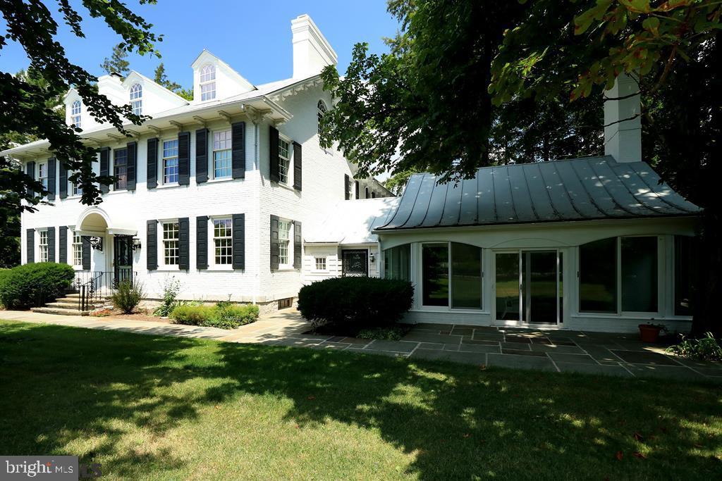 Please see important information from PennDOT pertaining to this property, i.e., the Michael Jack Estate & Corridor "O!"   Historical home preserves the outstanding building and workmanship qualities of the first homes that made up Springfield now known as Boalsburg.  The huge stone barn wall was preserved and repurposed to create a garden walk of fountains, stone walkways, pollination gardens, cascading and flowing stream with white arched bridges and paradisiacal ambiance.   This professionally restored 2.5 story home displays the grandeur of the oldest standing home & property of this area's first settlers.  It sits on 7.4 acres with mature trees, fish pond, and both Galbraith Gap Run and Spring Creek running through the parcel.   There are 3 offices for private or public offices permitted by zoning if needed.  The home offers 6200 sq ft of living area, all restored in the Renaissance Revival style of the 1860's.  Entertain in style in the spacious parlor with two faux marble fireplaces plus the huge dining room with 9' ceilings, fireplace and elegantly appointed.  The home has 9 fireplaces, 6-7 bedrooms, 4 full baths, butler's pantry, beautiful built-in cabinetry and hardwood floors. Upgraded electrical, HVAC, windows, and lots more to see, enjoy,  and call home.  This home and property are a monument to our history that deserves to be preserved for future generations to experience.  Call to schedule a phenomenal tour of a home 2 centuries old with up-to-date amenities! Be sure to check out the narrated video tour!