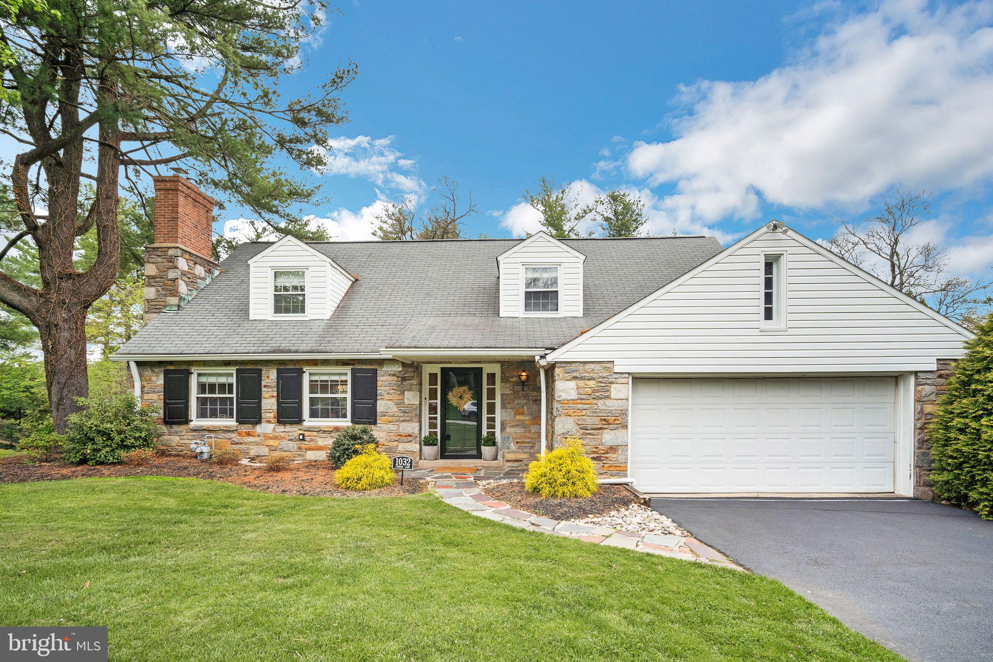 **Back on the market!  Showings start at the Open House on SATURDAY, 4/26.**  Experience the charm of this meticulously updated 5-bedroom, 4-bathroom cape nestled on a scenic half-acre lot. Revel in picturesque views from both the front and rear of the property. As you step inside, be greeted by oak random width pegged hardwood flooring in the living room, complemented by a chevron marble fireplace surround, recessed lighting, and custom millwork. The dining room boasts beautiful inset cabinets and caged chandelier lighting, leading to a kitchen perfect for entertaining guests. Admire the Calacatta Noble quartz countertop, Shaker cabinets, stainless steel appliances, and ceramic subway tile wall finish. A den with a vintage Malm fireplace and Pella sliders opens to an elevated rear porch with Trex decking. The first floor also features a spacious bedroom with built-in bookcases and a Pottery Barn vanity in the bathroom. Upstairs, find four bedrooms with ample closets and two full bathrooms, including a master bath with a vaulted ceiling and stunning tile finishes. The lower level offers a finished laundry room with vinyl plank flooring, new cabinets, and a bonus/work-out room with its own full bath. Additional upgrades include 200 amp service, new HVAC, plumbing, windows, doors, and landscaping. Located near Abington Friends School, Abington Arts Center, Avelthorpe Park, and local dining and shopping.