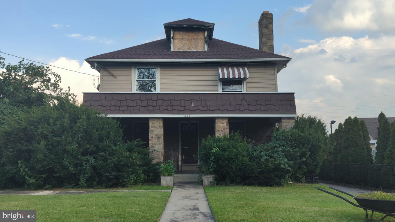 Detached Stone Duplex with a bonus unit in the basement and a large detached garage. The two units have separate electric, separate  entrances and  their own private patios. Home usage can be easily changed into either  a single family home or a duplex just by locking or unlocking one door. Perfect property for multi generational families that want to be close but also have their own private space or an investor looking for positive cash flow. Plenty of parking for everyone too. Home needs some work and is being sold AS-IS.