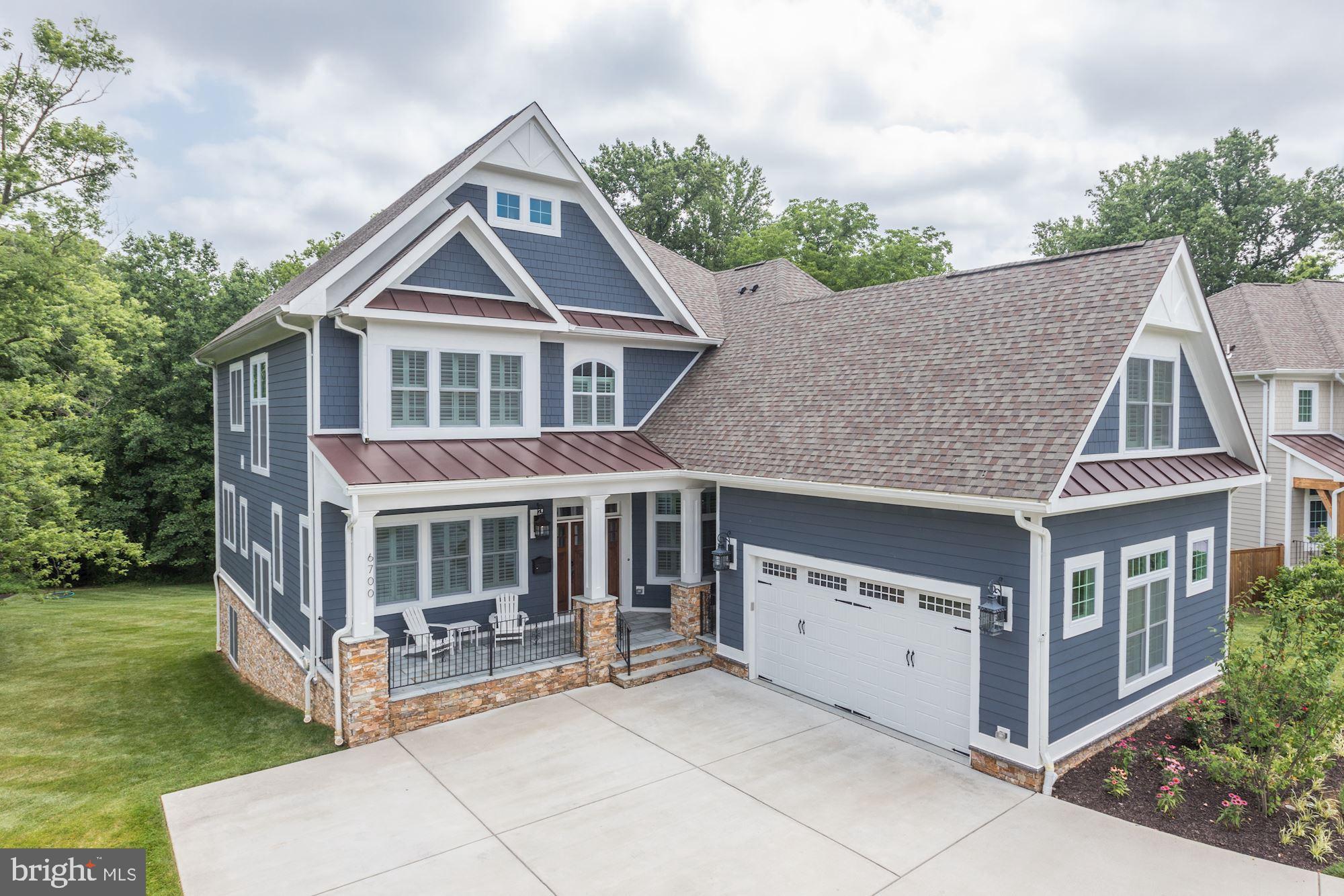 Pristine Newer Constructed Home on Amazing Private Half Acre Lot!  Beautiful 2016 Custom Build with Open Floor Plan is Packed with Options and Upgrades.  Gracious Foyer welcomes you into Main Level Flooded with Light and featuring a Family Room with Gorgeous Views of Mature Trees and Lawn.   Oversized Gas Stone Fireplace has Art Frame TV Screen that will Wow Guest!  Gourmet Kitchen is Packed with Thermador Appliances including Six Burner Gas Cooktop with Griddle and Oversized Fridge/Freezer.  Adjacent Butlers Pantry with Wine Cooler leads to Walk-in Pantry and Mudroom with Family Entrance as well as access to Oversized Garage with Coated Floor, High End Storage System and Wiring for Electric Car.  Dining Room with Custom Woodwork and Living Room are wonderful for entertaining.  Library with Built-ins has Large windows with incredible vistas.  A Screened Porch and Deck with Gas hookup for grill makes for easy Outdoor Living.  Upper Level Is accessed by Stairs with Wall of Windows and has Gleaming Hardwood Floors throughout.  Spacious Master Suite with Sitting Area and Fireplace includes Two Walk-in Closets with Custom Built-Ins. Master Bath with Separate Water Closet, Heated Floors and Dual Vanities.  Three Additional Bedrooms including one Ensuite and a Laundry with Cabinets complete this Private Area.  An Additional Suite is accessed through the Mudroom and would be perfect for In-Laws, Guests or Au-pair.  Lower Level has Full Light and Walks out to Covered Patio from Rec Room with Gas Fireplace and Bar.  Dedicated Exercise Room includes Mirrored Walls and gym Flooring.  Theatre conveys with existing Comfy Viewing Chairs and Screen.  Additional Bedroom is located on this Level as well as a Full Bath.  Conveying with Home is a Control4 Entertainment Hub with 8 Zones!!