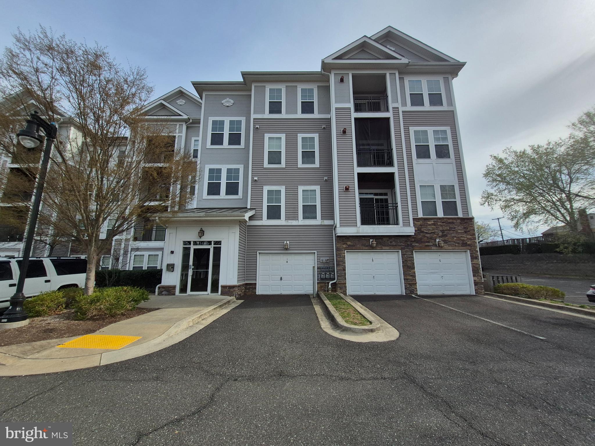 Discover this bright and spacious 2-bedroom, 1-bath condo in a sought-after gated community! This well-maintained unit features an open floor plan with granite countertops, cherry cabinets, and stainless-steel appliances. Enjoy carpet, as well as hardwood flooring in the kitchen and hallway, and a private balcony for relaxing outdoors. The unit includes in-unit washer/dryer and two resident parking spaces plus one visitor spot. Prime location—less than a mile from Addison Road Metro (Blue Line), minutes from I-495, shopping, dining, and a medical center. The community offers fantastic amenities, including a clubhouse, gym, playground, and water included in the condo fee.
