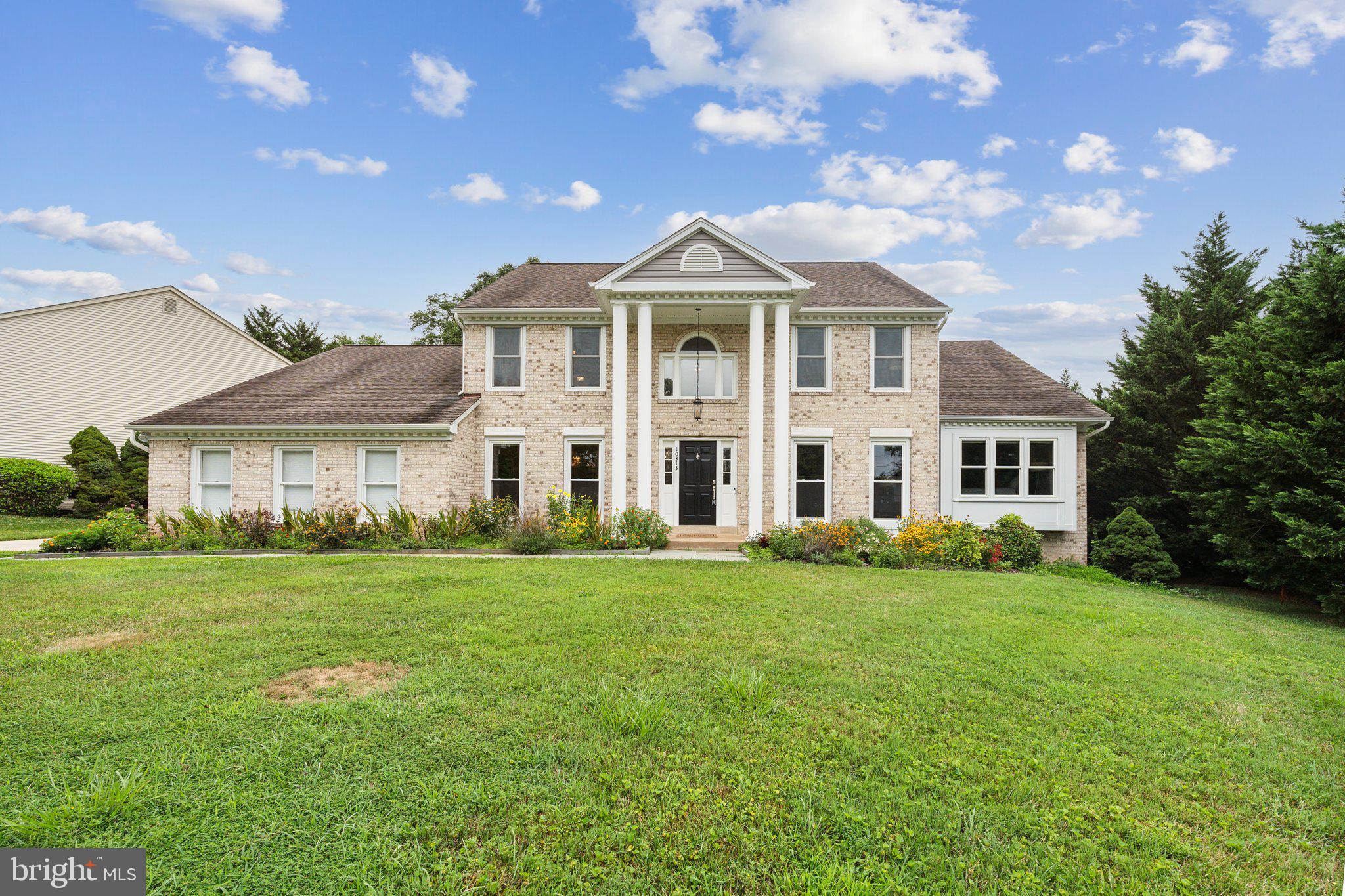 Welcome to 10313 Lewis Knolls Ct, a beautifully renovated Colonial home that combines classic elegance with modern upgrades. This property has been meticulously updated from top to bottom, including a completely remodeled kitchen featuring white shaker cabinets and Stainless-Steel professional series appliances.

The main level owner suite includes a cozy sitting room with a second fireplace, a large bedroom area, walk-in closet, and a grand bathroom with modern finishes, including a dual vanity, walk-in shower, and freestanding tub.

Upstairs, you'll find a bedroom with an ensuite bath, plus three additional rooms that can serve as bedrooms or a study, along with a shared updated bath.

The lower level features a huge recreation room with 1 year Mohawk luxury vinyl flooring, new paint, a full bath, and walk-out access to the fenced-in backyard. There's also ample unfinished storage space.

Additional upgrades include Thompson's Creek double-pane noise reduction windows, new window shades, gutters, siding, exterior paint, carpeting, 2 year old newly stained fence, and $12,000 standby automatic Generac generator.

Situated on a stately, flat lot with southern columns and a brick front, this home backs to parkland and is just a short walk to Oakton Shopping Center. Located in a Oakton school district, this home offers a perfect blend of affordability and luxury.