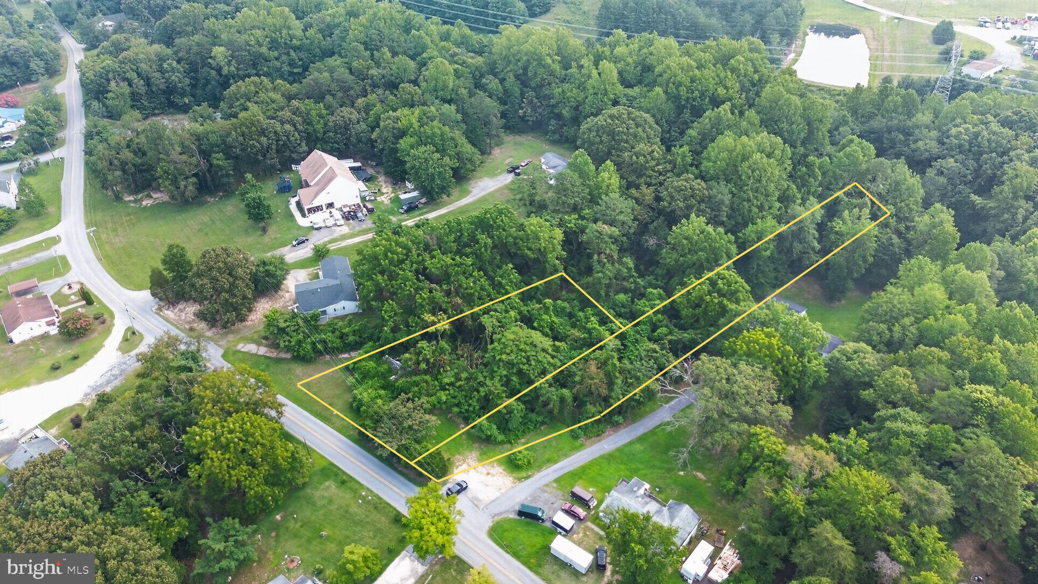 1.707± acre homesite in Prince Frederick, Calvert County! A well and septic system are presumed to remain in place from a previous home on the property, offering a potential head start on utilities compared to raw land — buyers should verify condition independently. A full boundary survey (April 2026) is included in documents. Aerial photos show approximate lot lines for visual reference only and are not drawn to survey precision; buyers and agents should rely on the survey, not the photos, for actual boundary locations. ** SDAT parcel information is incorrect and will require recording a replat after Settlement **