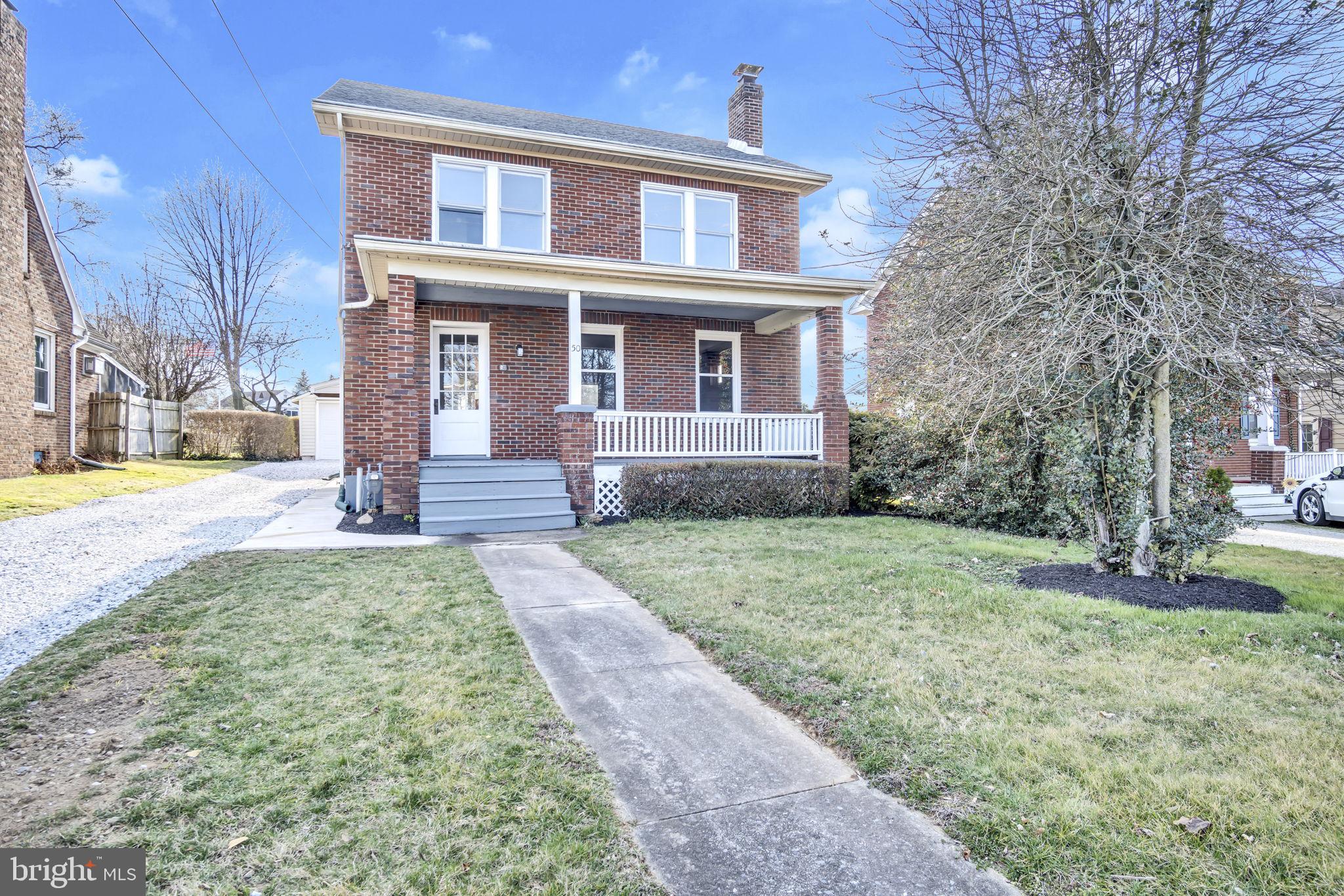 Welcome to your new home! This newly renovated, all brick colonial home in Central Schools offers a large living room and spacious dining room, an updated kitchen with additional cabinetry and counter space in the mud room. Upstairs you will find 3 bedrooms and an all new bathroom and at the attic level is a large, finished room that could be a 4th bedroom, office space, playroom or additional storage. The basement is full for ample storage and includes work benches and a washer and dryer. Outside you will find an inviting front porch, a detached garage with garage door opener and a lovely, private rear yard. This home has all new appliances, new paint, carpet and laminate flooring throughout. It is completely move in ready and convenient to everything!