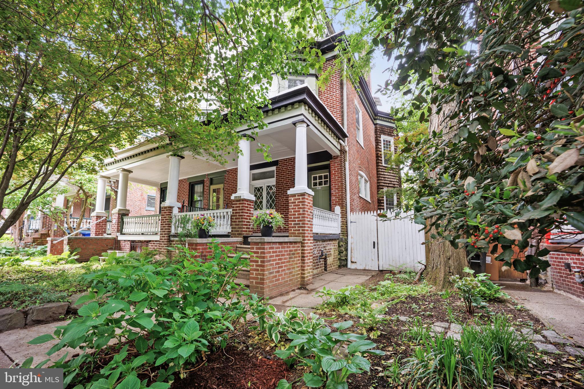 Welcome home to 5930 Pulaski Avenue, a polished twin set on a quiet, tree-lined street known for its wide layout and set-back homes in sought-after West Germantown. Filled with natural light, classic character, and modern upgrades, this 4-bedroom, 2.5-bath residence offers generous living areas, ample storage, and flexible space throughout.

The main level showcases refinished hardwood floors, original moldings, recessed lighting, and thoughtfully preserved details. The open living room features an exposed brick accent wall, built-in staircase bookcase, coffered ceiling detail, and a tiled fireplace. The large dining room offers oversized windows that pour in natural light, along with a built-in dry bar, making it ideal for entertaining. It flows into the updated eat-in kitchen, complete with a walk-in pantry, 42” upgraded white cabinetry, stainless steel appliances, a farmhouse sink, granite countertops, and a modern backsplash. A convenient mudroom/utility area with a powder room in the rear provides access to the fenced backyard.

The second floor is accessible by two staircases and opens to a generous landing and three well-sized bedrooms, including a primary bedroom with bay windows and a custom-built closet wall. A beautifully updated full bathroom features dual sinks and contemporary finishes, while a galley kitchen completes this level.

The third floor provides additional flexible living space with a fourth bedroom, a dedicated office or playroom, a hallway closet, a large walk-in closet with built-ins, and a surprisingly spacious full bathroom.

Ideally located near Clifford Park, the Wissahickon trails, local eateries, and Lincoln Drive, with easy access to Center City and the suburbs. A rare opportunity to own a thoughtfully updated home filled with character in one of Philadelphia’s most timeless neighborhoods. 5930 Pulaski Ave., welcome home.