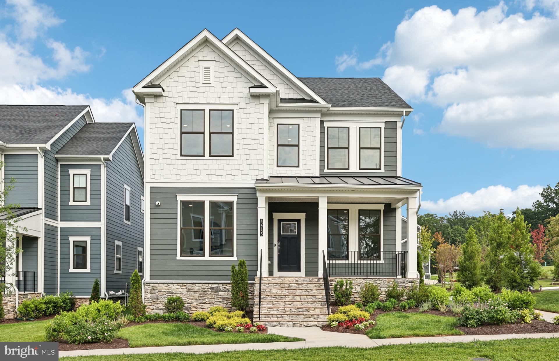 This Portland model is now available to make it your new home. With its deep front stone capped porch, you can enjoy relaxing and saying hello to your neighbors and friends.  As you enter the foyer, you are flanked by a study with French doors and a formal dining room. The kitchen is gorgeous and open to the café and the sunlit gathering room with a beautiful electric fireplace. There is a Trex deck with stairs to a stone patio and pergola.  As you enter from the two-car garage, there is a boot bench, cost closet, and private deck area. Enjoy the separate stairs to a private loft bedroom with a full bathroom that has a tile shower and bench seat as well as a walk-in closet and separate water heater and HVAC system.  Off the gathering room are hardwood stairs to the main second floor with 4 bedrooms, 3 bathrooms, and the laundry room. The owner’s suite features a trey ceiling, two walk-in closets, and a beautiful bathroom with a walk-in shower with two shower heads. Looking for more entertaining space, the Portland has a basement rec room with a wet bar, an additional bedroom and a full bathroom with a shower that has a bench seat.  There are many features that are included in this model home such as in ceiling speakers in the rec room, kitchen, café, gathering room, upstairs hall, and owner’s bedroom.