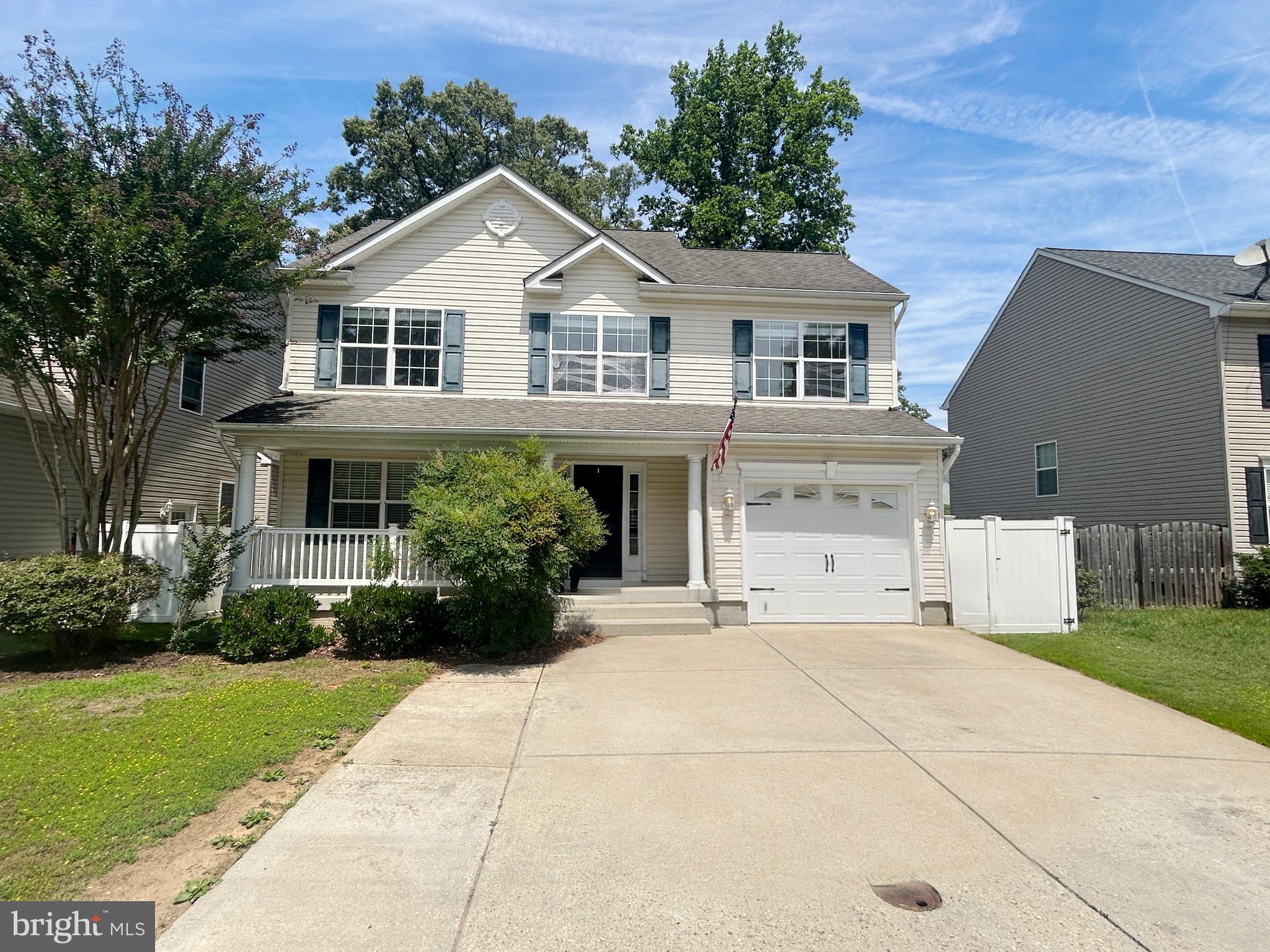 This exquisite Colonial-style residence, built in 2010, is situated in the desirable Green Haven subdivision. The property boasts a well-maintained exterior featuring vinyl siding and a charming front porch, complemented by an attached garage with a front entry and garage door opener for convenience. Inside, the home showcases a thoughtfully designed layout with three spacious bedrooms and two and a half bathrooms. The interior features include vinyl plank and carpet flooring, enhancing both comfort and style. The gourmet kitchen is equipped with stainless steel appliances, upgraded countertops, and a pantry, seamlessly connecting to the dining area for effortless entertaining. The spacious living space is accentuated by recessed lights and a ceiling fan, creating a warm and inviting atmosphere. The master suite offers a walk-in closet and a private bathroom complete with a dual vanity, and a soaking tub and a tub-shower combination, providing a perfect retreat. Additional highlights include a full, improved basement with interior access and walkout stairs, offering ample space for future expansion or storage. The outdoor space features a well-maintained front and rear yard, ideal for outdoor activities or gardening while the rear deck provides an excellent venue for gatherings. This residence combines modern amenities with a functional layout, making it an ideal choice for those seeking a comfortable and stylish living environment. Don't miss this opportunity to make this home your own! Schedule a showing today. Note - Some images in this listing have been virtually staged