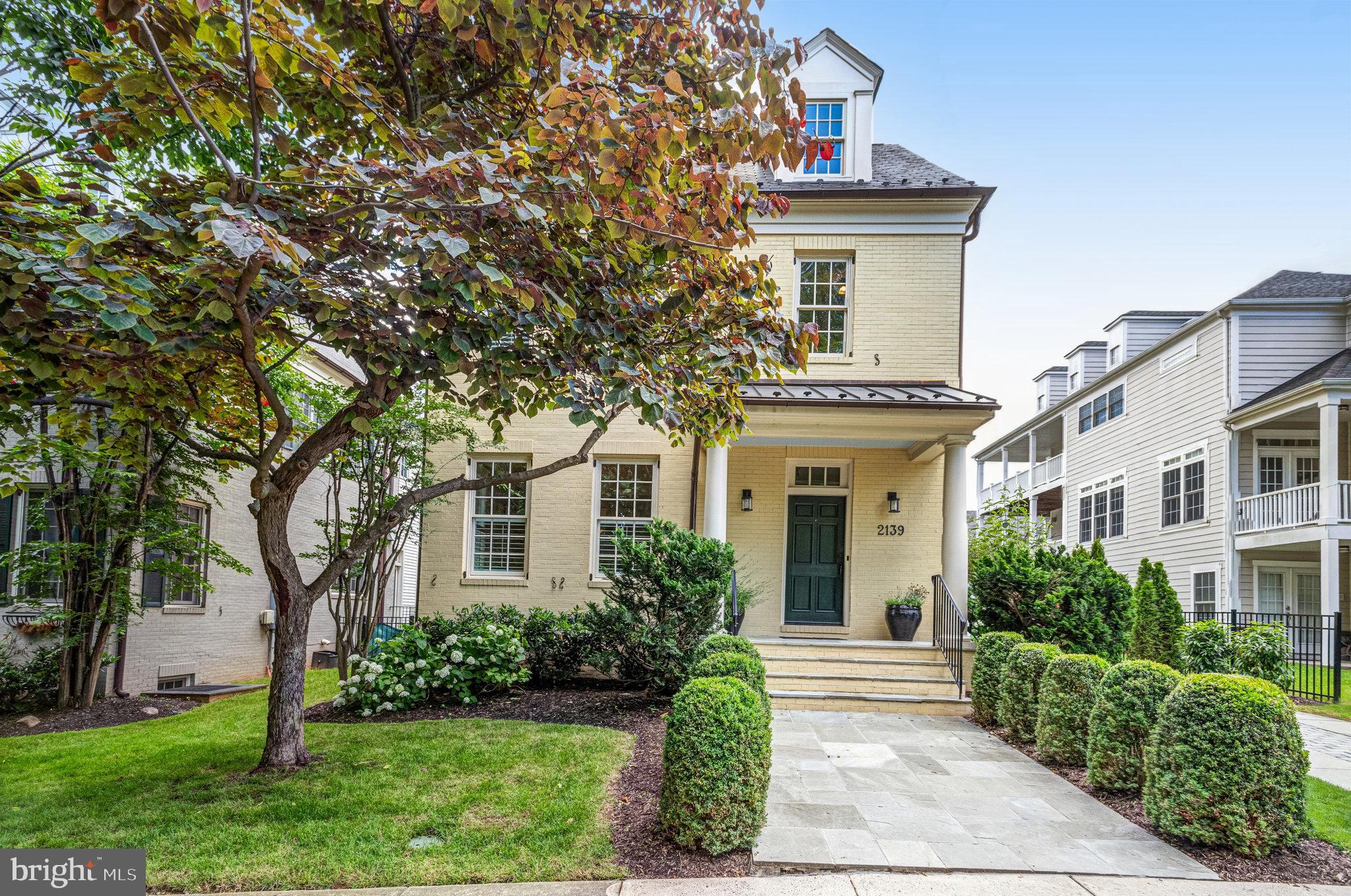 Open Sunday 1-4pm! Nestled quietly in a prime Rosslyn location and a short distance to everything! Beautiful sun-filled Colonial home, designed by the acclaimed Moore Architects, boasts stunning finishes throughout. Featuring antique reclaimed oak hardwood floors and numerous builder upgrades, this residence offers a chef's gourmet kitchen with a 48” 6-burner double-sided Wolf cooktop stove with griddle, Sub-Zero fridge and freezer, honed marble and granite countertops, all opening to a family room with coffered ceilings and plantation shutters. Main Level 11' ceilings!  Step out to a beautiful porch and fenced perfect  backyard. 1 Car detached garage with a room above (roughed in but not finished) perfect for an au pair suite or studio. 5 bedrooms upstairs, including a beautiful primary bedroom with a luxurious bath and walk-in closets, this home has an ELEVATOR shaft to all 4 floors. The lower level features a spacious rec room, an additional bedroom, and a full bath. Beautifully landscaped with Irrigation system. A commuter's dream location, this home is less than a 1-mile walk to Key Bridge, Rosslyn Metro, MOM's Organic Market, Courthouse, restaurants, shops, and more. Just steps away are the newly renovated Dawson Terrace Park and Custis Trail. Schedule a visit today!