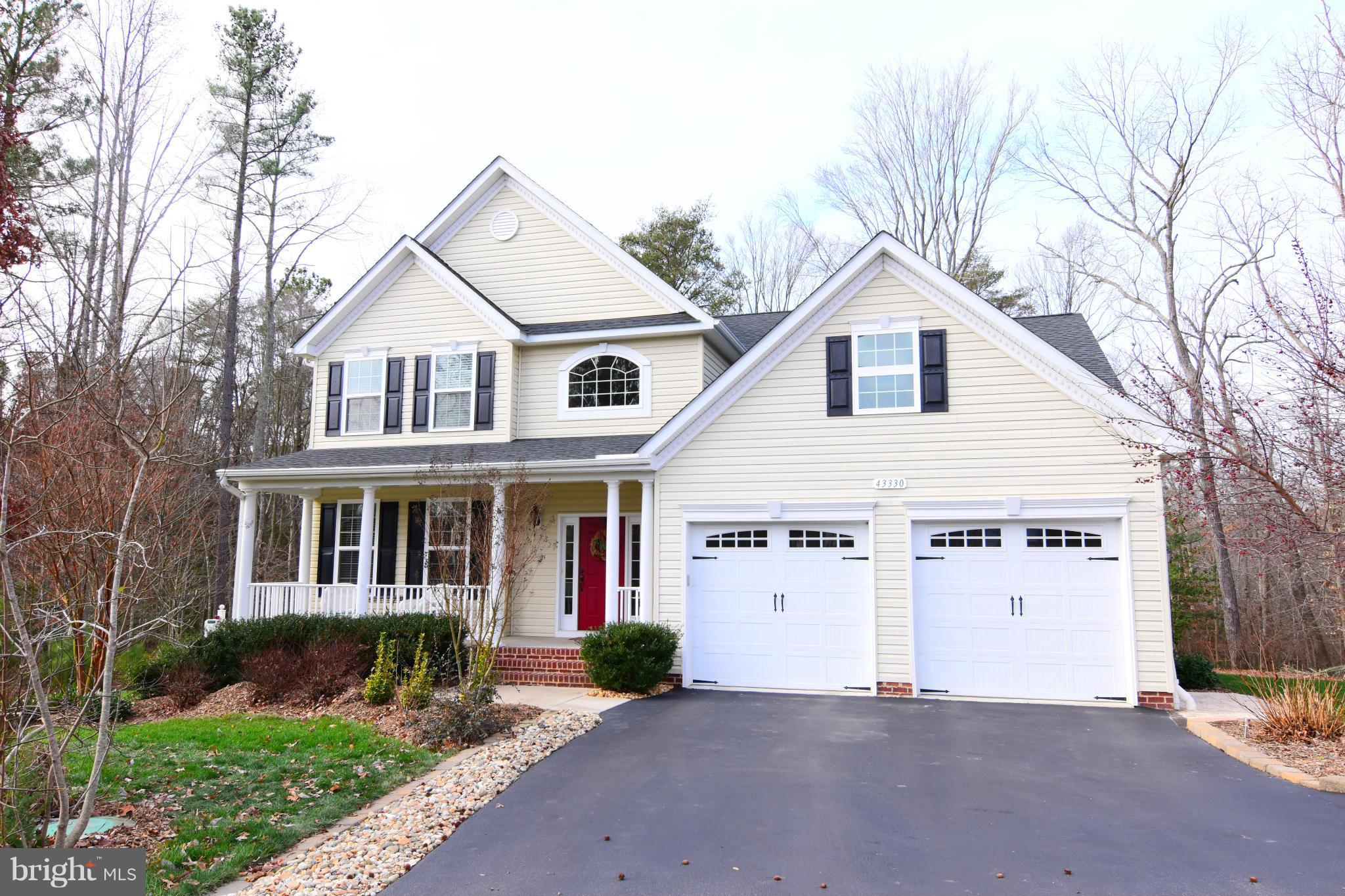 Lovely Potomac model with 1st floor master bedroom and shows like a model. Private lot at the end of cul de sac with lots of trees. Wood floors thru out most of the first floor, gourmet kitchen and butlers pantry. Gas fireplace in two story family room. Lots of large windows for natural light. Basement is finished with an office, theater room, rec room, workshop and storage areas.
