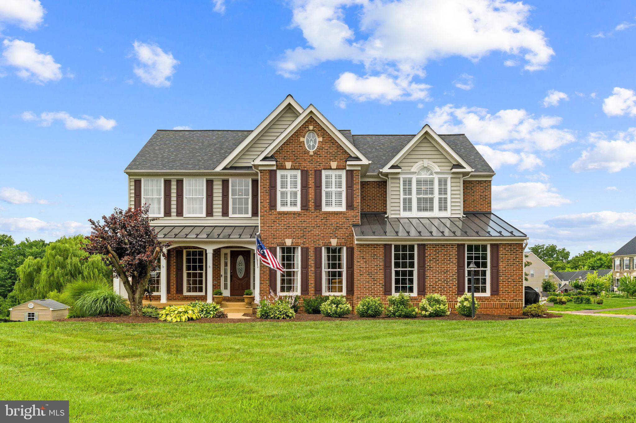 Exceptional multi-generational living and rental income potential define 15616 Great Bridge Lane, a beautifully updated and meticulously maintained 6-bedroom, 4.5-bath estate residence. Set on over a half acre  on a corner lot in Madison Grove, this home offers refined finishes, modern conveniences, and versatile living spaces designed to meet a variety of lifestyle needs. Thoughtfully updated throughout, this home is designed for both elegant entertaining and comfortable everyday living. 
<br><br>

Rich hardwood flooring extends throughout  the main level, staircase, upper landing, primary suite, and additional bedrooms, creating warmth and continuity throughout the home. The expansive floor plan features gracious formal and informal living spaces, while the updated kitchen serves as the heart of the home with refreshed cabinetry, soft-close hardware, premium Bosch and KitchenAid stainless steel appliances, and timeless finishes. 
<br><br>

The luxurious primary suite provides a private retreat with generous proportions, doube walk-in closets and a sitting area, while the additional bedrooms offer flexibility for family and guests. The fully finished walk-out lower level provides outstanding flexibility with a private suite and nearly finished full kitchen which will feature a cooktop, wall oven, microwave, and sink, creating the perfect setup for multigenerational living, an au pair suite, long-term guests or potential rental income. 
<br><br>

Significant recent improvements provide peace of mind and modern efficiency, including a new roof with standing-seam metal accents, updated hot water heater, enhanced laundry room cabinetry, and extensive luxury vinyl plank flooring in select areas. Technology and convenience are seamlessly integrated with whole-home Ethernet wiring, a foyer chandelier lift system, and a Tesla EV charger on a dedicated 60-amp circuit in the garage.
<br><br>

Outside, professionally refreshed landscaping, fresh mulch, and a meticulously maintained exterior create exceptional curb appeal. Despite its peaceful setting, 15616 Great Bridge Lane is just minutes from downtown Culpeper, where you'll enjoy an array of locally owned shops, restaurants, breweries, and everyday conveniences, offering the perfect balance of privacy and accessibility. Combining sophisticated updates, flexible living arrangements, and premium amenities, this remarkable residence offers a rare opportunity to enjoy luxury, comfort, and convenience in one of Culpeper County's most desirable settings.