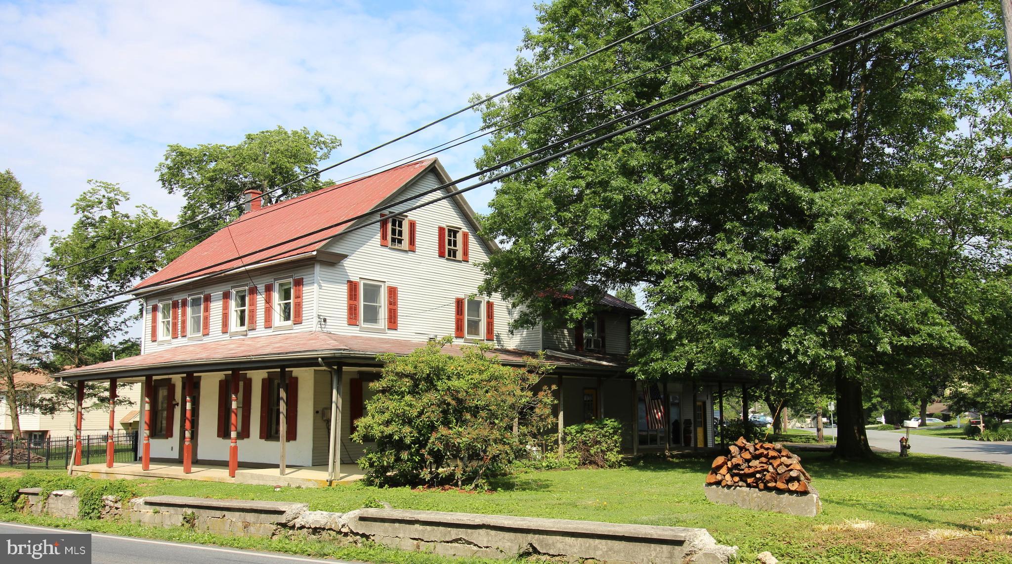 Charming Warwick Schools Farmhouse built in 1890  (Possibly prior. A signature  found outside of Bathroom is dated 1886. It is still visible as that was not painted over.) with  Versatile Floor Plan. Fenced Yard with Mature Trees. Large 2 Sided Covered Porch to Enjoy. Looking for a Hobby Garage? This home has a 1,020 Square Foot attached Garage. Large  Eat in Kitchen Area with Openings to Family Room Area for Great Entertaining Space. Workshop or Craft Room is Behind Kitchen Area. Four Other First Floor Rooms for Many Choices on How to Use the Space. Second Floor Features a Large Bedroom with Cathedral Ceiling and it's Own Private Staircase to Kitchen Area. Two more Bedrooms, Bathroom, and Laundry on the Second Floor.  Freshly Painted with New Carpet and Dishwasher was Replaced.  In the Kissel Hill Section of Lititz Close to the Elementary School and Shopping.  2 Zoned Hot Water Gas Heat along with Wood Stove.    Be Sure to Click Camera Icon to View All Photos, Walk Through Video and the Full 360 Degree Virtual Tour. Use your VR HEADSET to Take a Virtual Reality Tour of this home via the Kuula 360 Degree Spherical Tour link.