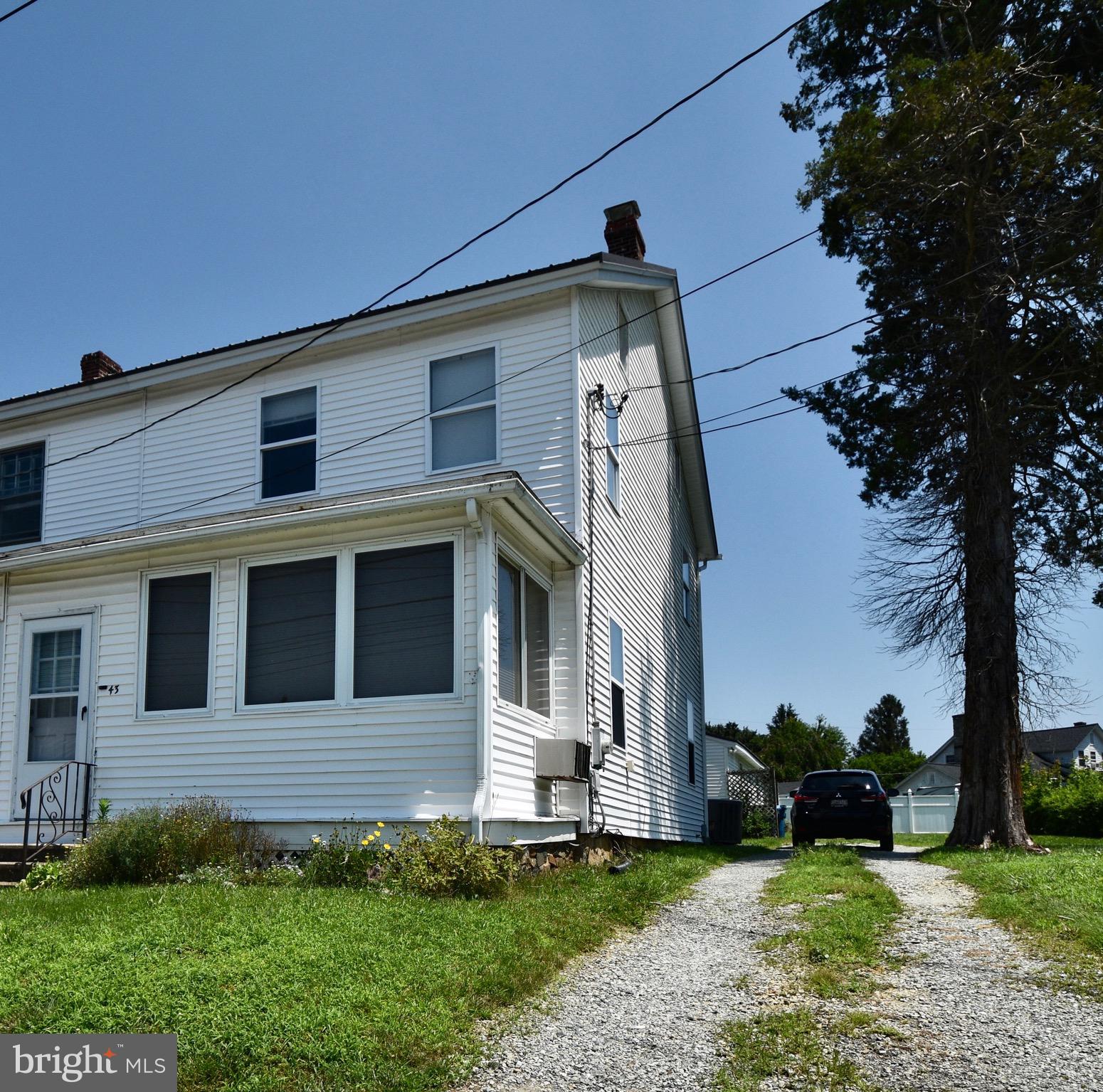 A great starter home for town living… stores, shops, schools, banks, and a  pharmacy are all within a walking distance away of this 3br 2full bath home. Beautiful hardwood floors, metal roof less than a year old, brand new oil tank/filter lines, and an enclosed front porch. The views from the bedrooms are some of the best around … what a great way to start a life in this affordable air conditioned home…Schedule a tour today!