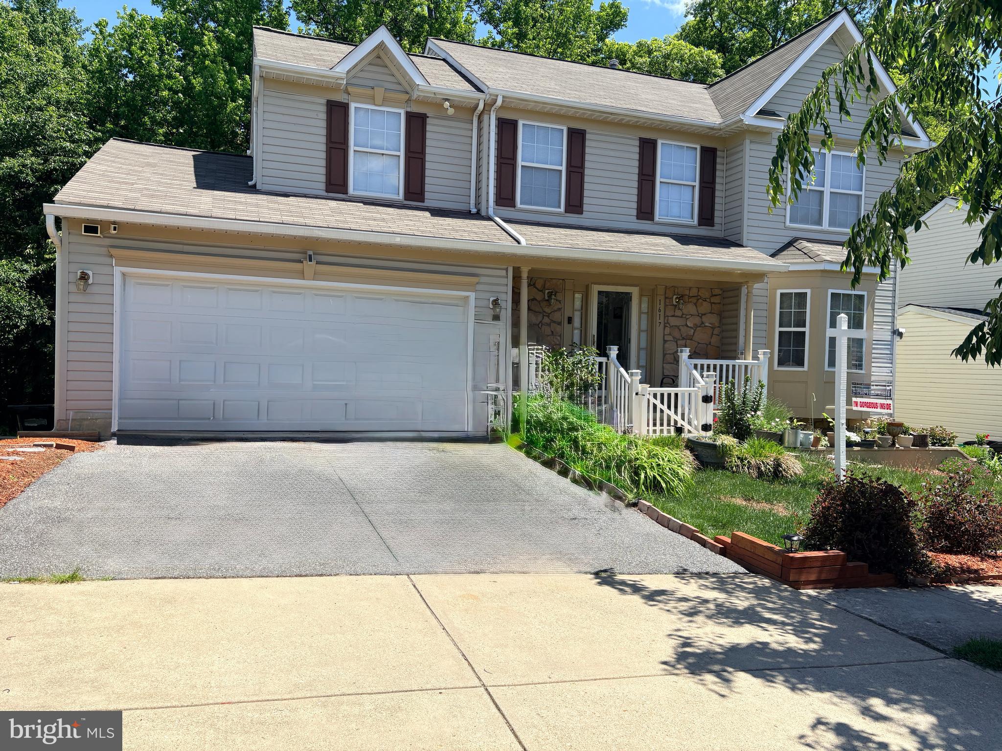 Welcome home to this beautifully maintained Colonial-style single-family residence in the heart of District Heights! Built in 2001, this spacious home offers 3 bedrooms, 3 full bathrooms, and 1 half bath, along with a 2-car garage and two additional driveway parking spaces.

Step inside to discover a bright and inviting layout filled with natural sunlight from the abundance of windows throughout the home. The elegant bay window in the front adds charm and curb appeal, while the wooded backdrop creates a peaceful, nature-filled retreat right in your backyard.

The main level features beautiful wood floors, a welcoming family room, a formal dining room, and a cozy breakfast area and a versatile flex space that creates the perfect flow for entertaining. The kitchen is outfitted with stainless steel appliances, new countertops, a new refrigerator, and a gas stove—ideal for both everyday cooking and hosting guests alike.

Upstairs, you’ll find spacious bedrooms with carpeting and generous closet space.  The primary suite offers an ensuite bathroom with a jetted tub and double sinks, It also boast a generous sized walk-in closet and sitting area.  Throughout the home there is stylish LVP flooring for durability and modern appeal.

The fully finished basement expands your living space with a spacious recreation room, two bonus rooms, a full bathroom, and laundry area and storage—offering endless possibilities for a home office, gym, guest space, or media room.

Enjoy outdoor living with a patio accessible through sliding glass doors at the lower level and a deck outfitted with retractable awnings overlooking the serene wooded backyard.

Conveniently located near shopping, dining, and commuter routes, 

This home also features an assumable 2.5% interest rate through Carrington Mortgage—an incredible opportunity for qualified buyers.

Don’t miss your chance to own this spacious, light-filled home in a convenient and desirable location!