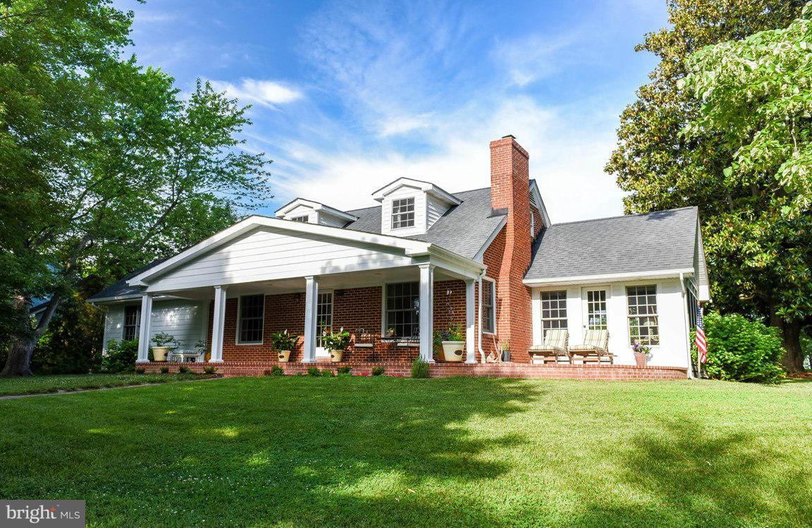 Wow! Step into this rare waterfront gem! Beautifully appointed - marble island, granite tops, hardwood floors,to expansive sunroom, porcelain tiled kitchen & vaulted ceilings. Peaceful setting professionally landscaped. Deep water access -private pier  w/ elect/water & boat lift. Relax on slate patio or covered porch. Amazing 3 car garage w/ finished 1bed & full bath. Subject to release pending