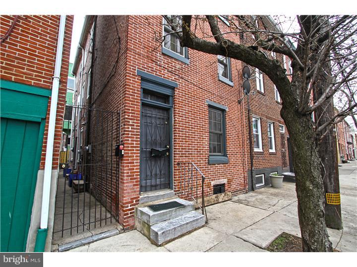 Charming Trinity turn of the century 2 bedroom with 1 bath in Northern Liberties. This home is a true trinity with lower floor kitchen complete with a laundry utility room, tile flooring, gas range, built in refrigerator and dishwasher plus room for dining. Every room has a touch of rustic exposed brick, a feature we love almost as much as the 2 working wood burning fireplaces in the living room and bedroom! This home has dark chocolate hard wood floors throughout that pair well with the old world charm features. A 2nd floor and 3rd floor bedroom with ample closets space and a full bath on the 2nd floor is completely renovated and offers storage as well as a soaking tub and shower combination. Walkable friendly location close to all of Northern Liberties social spots and shopping. Fantastic price for the neighborhood. Added bonus,PARKING!! Secure parking spot on 6th Street in fenced in lot with security cameras. Monthly fee $36/month for parking. Come check out this amazing property today!