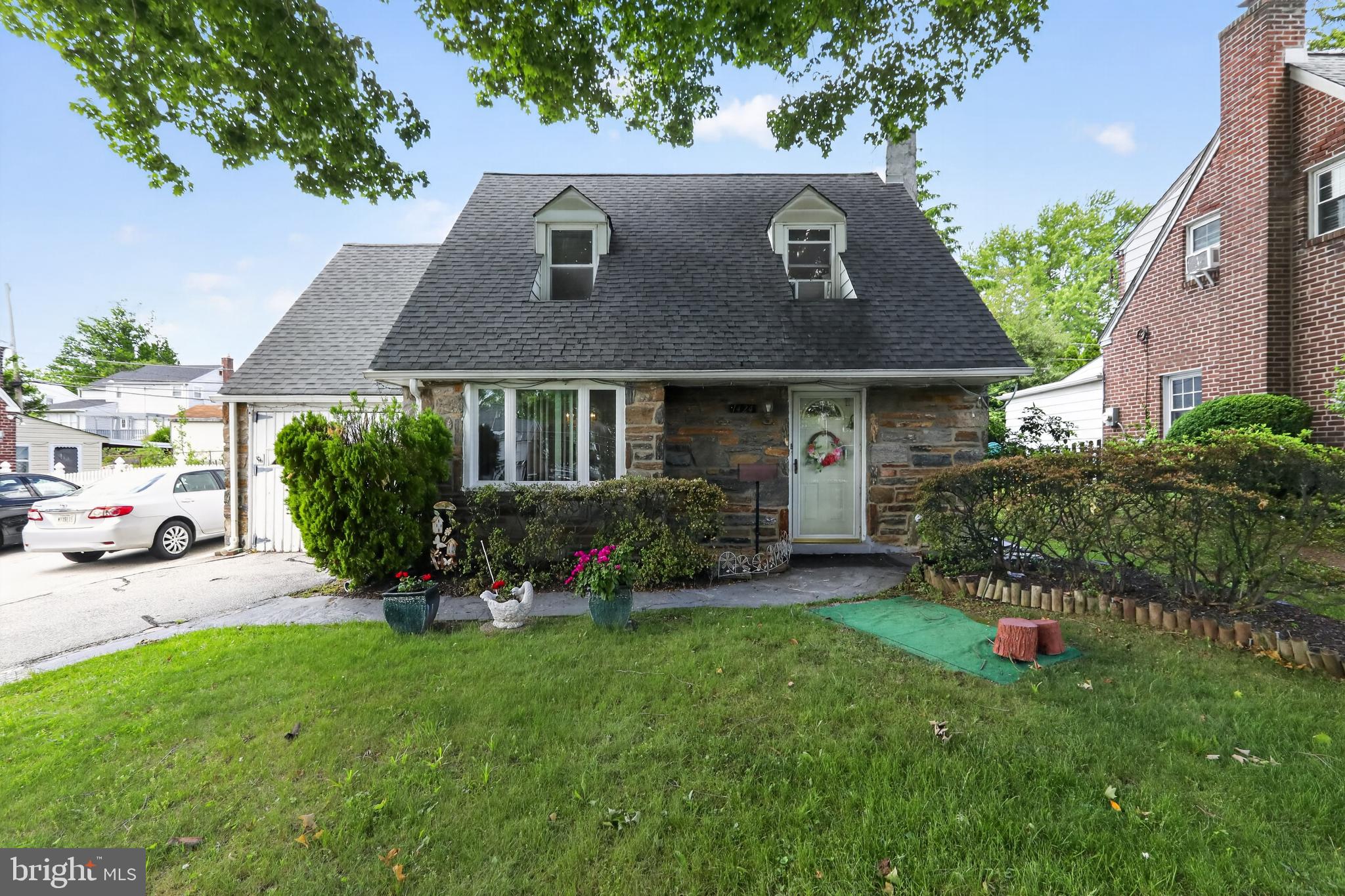 Welcome home to 1424 Burmont Rd. Located in the highly desirable Haverford School District. This 3 bedroom 1.5 bath property has been lovingly cared for by its owner of over 30+ years. 
Real stone front adds to this properties charm, as well as mature trees for extra shade in the summer. Enter into the living room which flows into the formal dining room, with a large picture window that allows for loads of natural light. The kitchen has Granite overlay countertops, a double bowl stainless steel sink, Tile Backsplash, and room for a small table. Off of the kitchen there is an addition, perfect for dining and makes you feel like you’re dining outdoors. Both the kitchen and dining room have newer tile flooring. The first floor also offers a super convenient first floor laundry and half bath! The second floor offers 3 bedrooms and a hall bath upgraded with a walk-in shower. The fenced rear yard is landscaped and provides a peaceful place to relax outside. This home also offers a rear 3-4 season room addition. Perfect for enjoying your morning coffee or for entertaining. This will definitely be one of your favorite rooms. The rear yard also has a shed for storing outdoor tools and other items. The large driveway offers parking for multiple cars. Upgrades include, newer Heater, Water heater, replacement windows and 100 amp electric. This home is located within minutes to shopping, dining, transportation and major routes. Come take a look!
