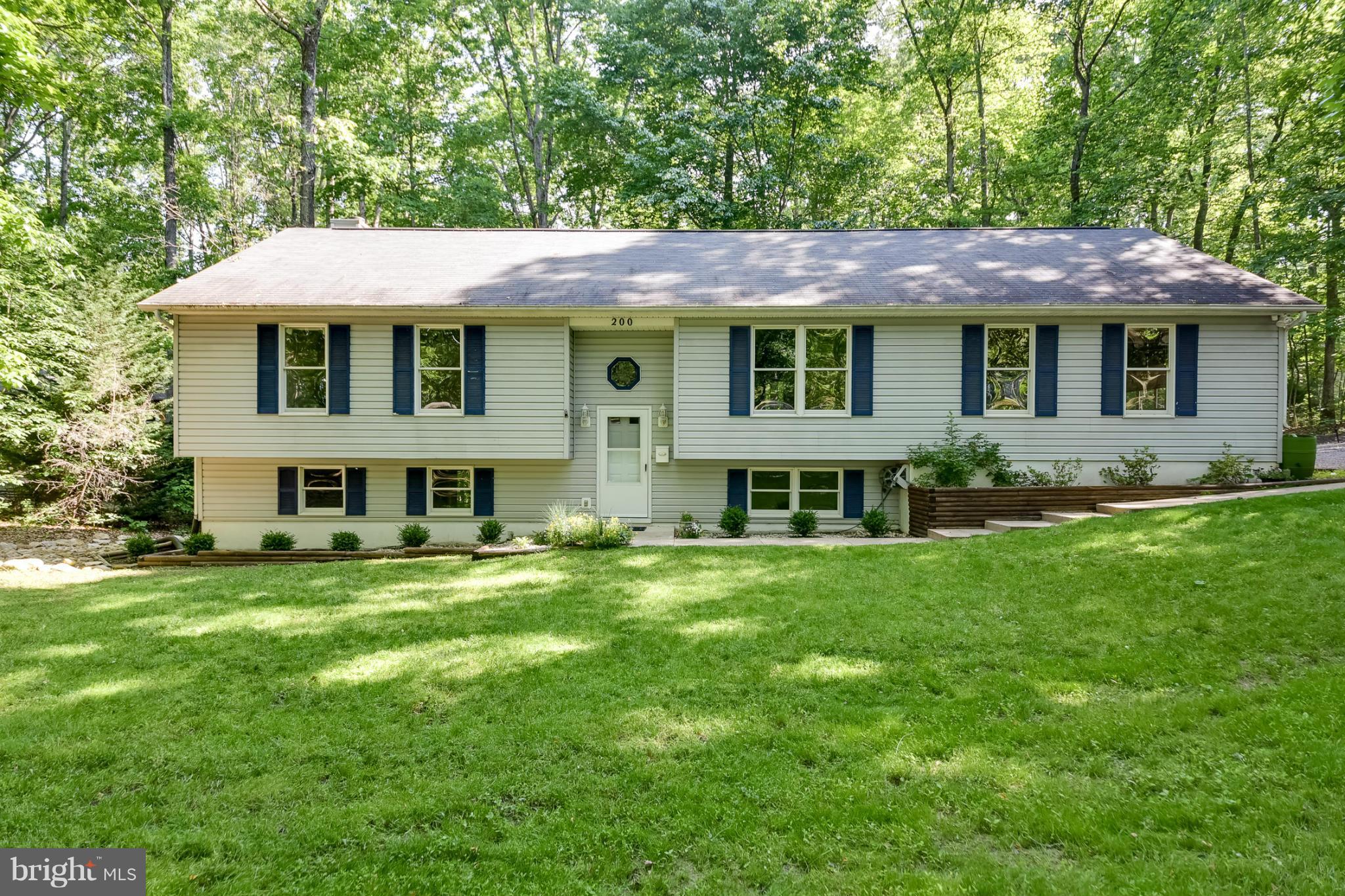 A RECIPE FOR RELAXATION! Upon entering this home, immediate attention is drawn to the warm & relaxed feel.The home features a newly renovated kitchen, beautiful hardwood floors, updated bathrooms, & new carpet! Downstairs finds a finished basement ready for entertaining & movie nights! Outside your new home, enjoy the pool, clubhouse, walking paths, lakes, a little golfing, & grab a bite to eat!!