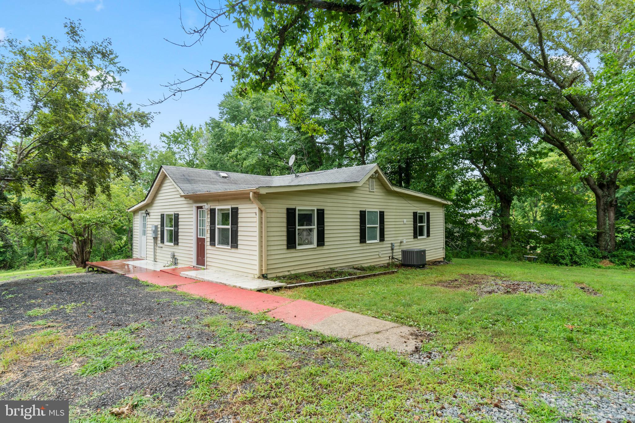 Enjoy country living with all the city conveniences nearby in this adorable Bungalow ready for your personal touch.  Granite Counter tops with stainless steel appliances. The home sits on 1.5 Acres and includes 2 sheds.  A short distance to Quantico, ample shopping, dining and I-95.