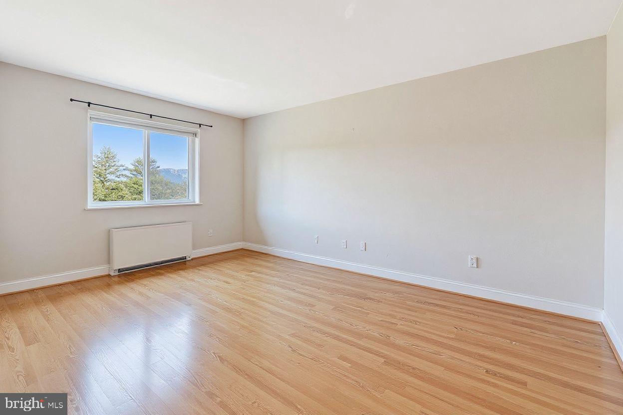 Bright, move-in ready studio just minutes from DC—perfect for first-time homebuyers or anyone tired of renting! This beautiful freshly painted, sun-filled unit at The Fairmont features an open floor plan, upgraded wood flooring throughout entire unit, in-unit washer/dryer combo,  new refrigerator, and a large walk-in closet. Secured-access building with elevator, assigned parking, plus ample guest parking. The condo fee includes water and gas utilities, exterior property maintenance, and—providing convenience, cost predictability, and low-maintenance living. Enjoy convenient amenities including a swimming pool, picnic area, and on-site laundry. Ideally located just a short walk to the DC line, minutes away from Takoma Park, Silver Spring, Fort Totten Metro, University of Maryland, Catholic University, Trinity University, shopping, and much more. Affordable ownership with unbeatable convenience—schedule your tour today!