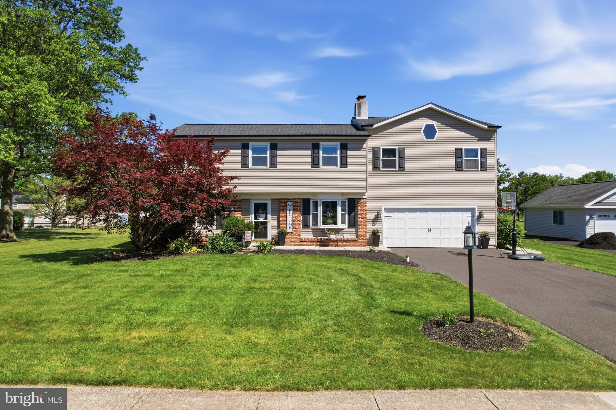 Located in a charming sidewalk-lined neighborhood in the sought-after Towamencin Township, this beautifully maintained 4-bedroom, 3 full-bath home sits on just over a half-acre and offers the perfect combination of space, style, and convenience within the award-winning North Penn School District. Enjoy the charm of a sidewalk-lined community with no HOA fees and a location that offers both convenience and tranquility!

Upon entering the front door you discover a bright and airy interior featuring updated flooring and fresh paint throughout. The heart of the home is the stunning eat-in kitchen, offering abundant cabinetry, generous workspace, and an inviting layout that opens seamlessly to the spacious family room. Oversized windows flood the family room with natural light while providing picturesque views of the private rear yard.

Designed with both comfort and functionality in mind, the home offers generously sized bedrooms, three full bathrooms, and the convenience of second-floor laundry. The oversized primary suite serves as a true retreat, featuring a luxurious spa-like bathroom and ample space to unwind at the end of the day.

Outside, you'll find the perfect setting for entertaining or relaxing. Enjoy summer evenings on the patio, soak in the hot tub, and take in the peaceful surroundings of the expansive backyard.

An unfinished basement provides endless possibilities and exceptional storage space, while the attached garage adds everyday convenience.

Combining spacious living, thoughtful updates, a fantastic neighborhood setting, and an ideal location, this exceptional property offers everything today's buyers are searching for. Schedule your private tour today!