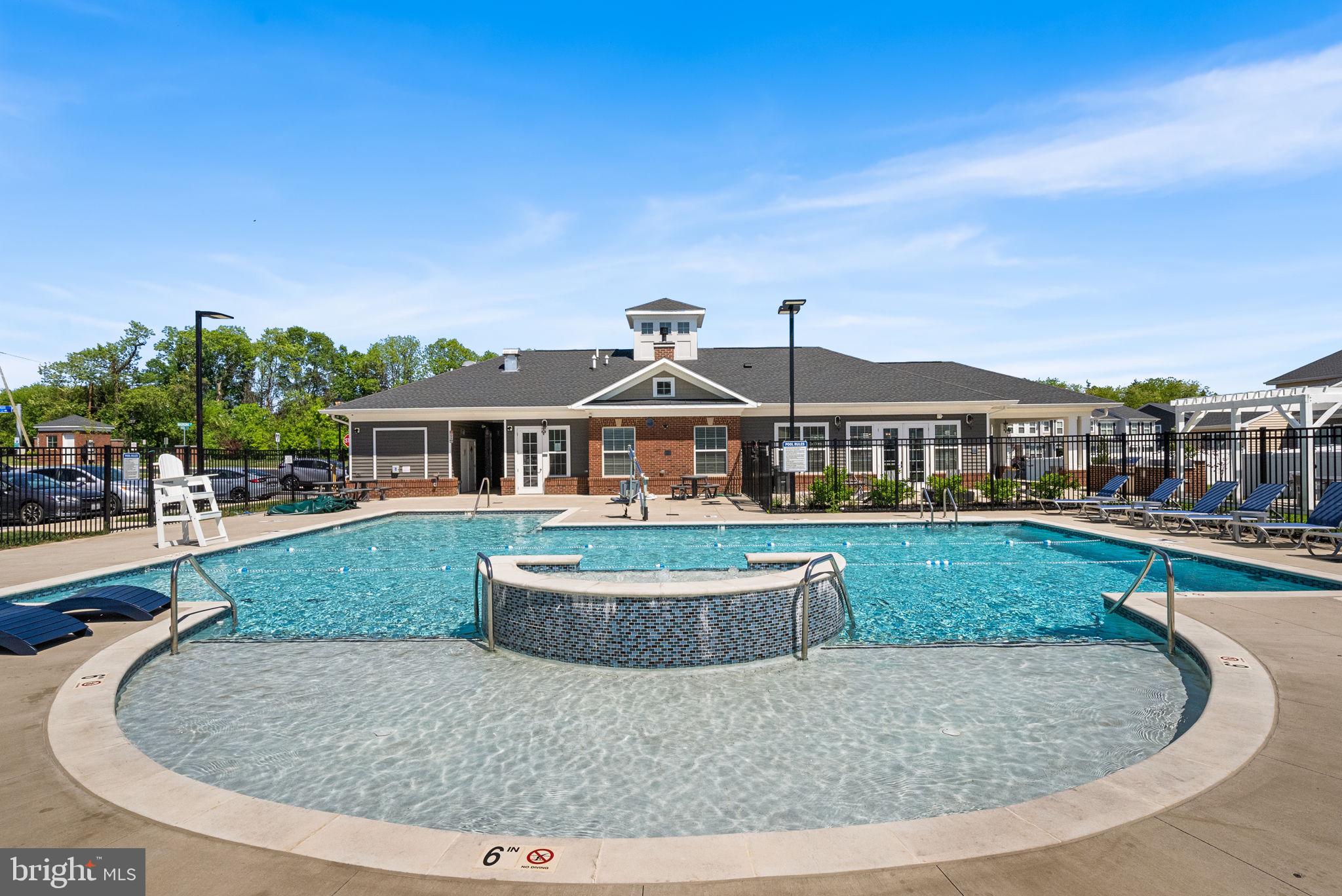 Seller is offering 1 yr of prepaid HOA Fees! Welcome to 13950 Englefield Dr #202, located within a 55+ community designed for comfort, connection, and a lifestyle that allows you to focus on what matters most.

This is more than a condo, it’s a place where neighbors become familiar faces and daily life feels lighter. Enjoy access to a welcoming clubhouse, fitness spaces to stay active, and social opportunities that make it easy to stay engaged and connected. Whether it’s a morning routine, an afternoon conversation, or a planned gathering, there is a natural rhythm here that helps you feel at home.

Beyond the community, the surrounding Quartz District is evolving into one of the area’s most exciting lifestyle destinations. Planned additions include walkable dining, retail, and green spaces, all designed to bring convenience and connection together. As this vision continues to come to life over the next several years, homeowners here will benefit from both an enhanced lifestyle and long term value.

You are just minutes from Stonebridge at Potomac Town Center, Wegmans, Alamo Drafthouse, and a wide variety of shopping and dining options, along with easy access to I 95, Route 1, and commuter routes to Quantico, Fort Belvoir, and Washington DC.

Inside, the condo offers a comfortable, low maintenance layout designed to make everyday living feel easy. With two spacious bedrooms, each with its own private bath, everyone has their own space to relax and unwind. A versatile den offers the flexibility for a home office, quiet reading room, or even a third bedroom for visitors.

This is where your next chapter can feel effortless, connected, and truly enjoyable. Call today to schedule your private tour.