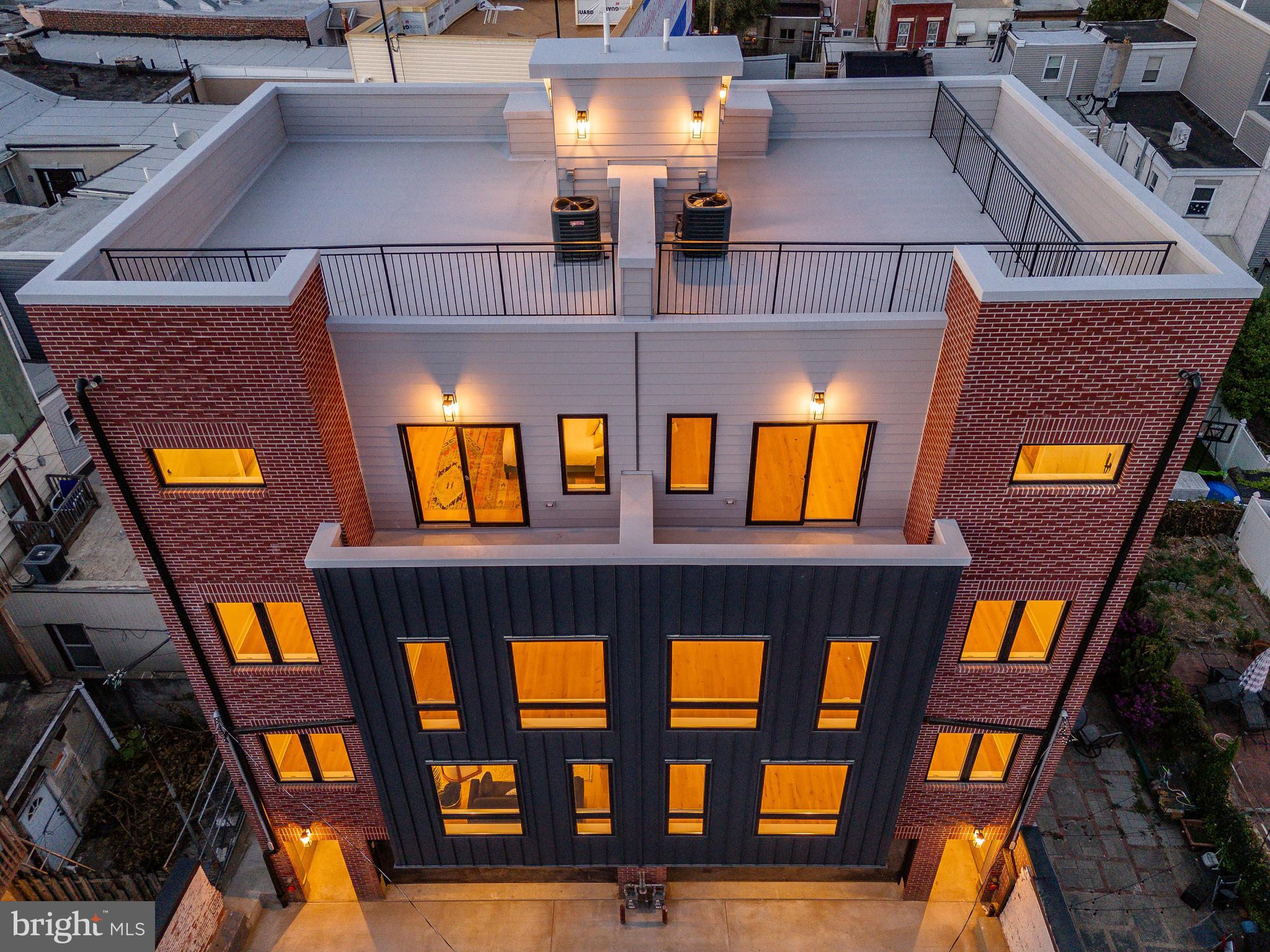 Discover an extraordinary blend of luxury, space, and convenience in this stunning new construction home in South Philadelphia! Designed with a double-wide layout, this home is flooded with natural light from every angle, creating a bright and airy atmosphere that feels both grand and inviting.
Boasting 4 spacious bedrooms, 3 full baths, and 2 half baths, this meticulously designed residence offers an abundance of thoughtfully curated living space across multiple levels. The chef's kitchen is a showstopper, featuring top-of-the-line Thermador appliances, a walk-in pantry, and an open layout that is perfect for both intimate dinners and large gatherings.
The primary suite is a true sanctuary, complete with a massive walk-in closet leading to a spa-inspired bath, where you can unwind in an oversized shower and soaking tub. Every detail has been considered, from the large laundry room to the ample storage and custom-built closets throughout.
Step outside to enjoy four private outdoor spaces, including a breathtaking roof deck with panoramic views of the Philadelphia skyline, and the Stadium, home of the World Champion Ealges! The roof deck is a perfect backdrop for entertaining or relaxing. Parking is a breeze with a two-car garage and potential for additional secure guest parking, an absolute rarity in this sought-after neighborhood.
Tucked away from the street for ultimate privacy, yet just steps from South Philly's vibrant culture, renowned restaurants, and the iconic Mummers tradition, this home offers the perfect balance of city living and serene retreat.
