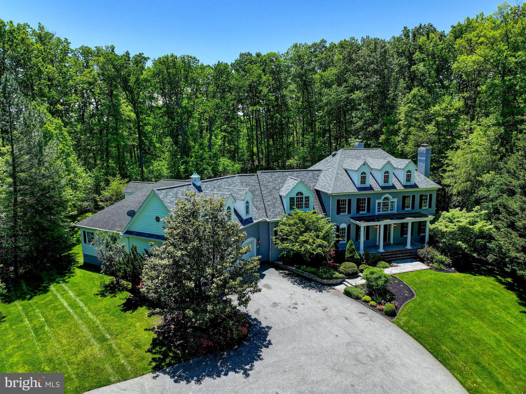 This home is ideal for Multigenerational living (two primary suites, two kitchens and 2 laundry rooms)

Set on over **three private acres** in the highly sought-after **Hereford Zone**, 1637 Cold Bottom Road in Sparks, Maryland offers an exceptional blend of space, elegance, and timeless luxury. With more than 9,000 square feet of beautifully finished living space, this remarkable brick estate is designed for both grand entertaining and comfortable everyday living.
A welcoming large front porch sets the tone, offering the perfect place to relax and take in the serene surroundings. Inside, the home features six spacious bedrooms, five full baths, and a powder room, including an impressive **primary suite on the main level** and an additional expansive primary suite upstairs—ideal for multigenerational living or hosting guests in style. Dual front and back staircases add both convenience and architectural charm, while a dedicated first-floor office with custom built-ins provides a refined workspace. Laundry rooms on both levels further enhance everyday ease.
At the heart of the home, a stunning white chef’s kitchen showcases Shaker-style cabinetry, sleek granite countertops, an oversized island, and premium stainless steel appliances. Gleaming hardwood floors, abundant recessed lighting, and three fireplaces create a warm yet sophisticated ambiance throughout.
Step outside to a resort-style backyard designed for relaxation and entertaining. Enjoy the heated Elite pool with integrated sun deck, unwind in the hot tub, and take in the extensive hardscaping and professionally landscaped grounds that elevate the outdoor experience.
Additional highlights include a three-car garage and flexible living spaces ideal for an in-law or guest suite. Located within a top-tier school district, this extraordinary property offers the perfect combination of luxury, privacy, and convenience.