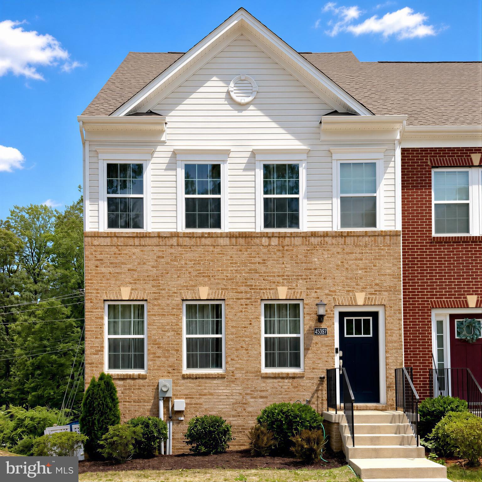 Welcome to 45397 Englewood Way, a beautiful 3-level end-unit townhome in The Woods at Myrtle Point, located just minutes from NAS Patuxent River in desirable California, Maryland. Built in 2020, this newer home offers the quality, comfort, and modern finishes buyers want — without the wait for new construction.

Inside, you’ll find 3 bedrooms, 2 full baths, and 2 half baths across three bright and spacious levels. The heart of the home is the impressive gourmet kitchen, featuring a massive 14-foot granite island, stainless steel appliances, crisp white cabinetry, a walk-in pantry, and plenty of space for gathering, entertaining, and everyday living. The open main level is filled with natural light, while the finished lower level offers flexible space for a rec room, home office, guest area, or workout space, complete with newly installed luxury vinyl plank flooring. A custom dry bar with wine storage adds a stylish designer touch.

As an end-unit, this home offers extra light, added privacy, and a more spacious feel throughout. The Woods at Myrtle Point community provides access to desirable amenities, including a community pool, playground, Early Child Development Center, and Myrtle Point Beach. The HOA covers trash service, community pool access, and other neighborhood amenities, helping create a convenient and low-maintenance lifestyle.

The location is hard to beat — minutes from Pax River Naval Base, shopping, dining, schools, and everyday conveniences. Head east for a wide variety of restaurants and retail options, or travel west across the Thomas Johnson Bridge to enjoy Solomons Island, known for waterfront dining, local seafood, marinas, and coastal charm. With Washington, D.C. and Northern Virginia just a little over an hour away, this home offers the perfect blend of Southern Maryland comfort, convenience, and accessibility.

Welcome home!
