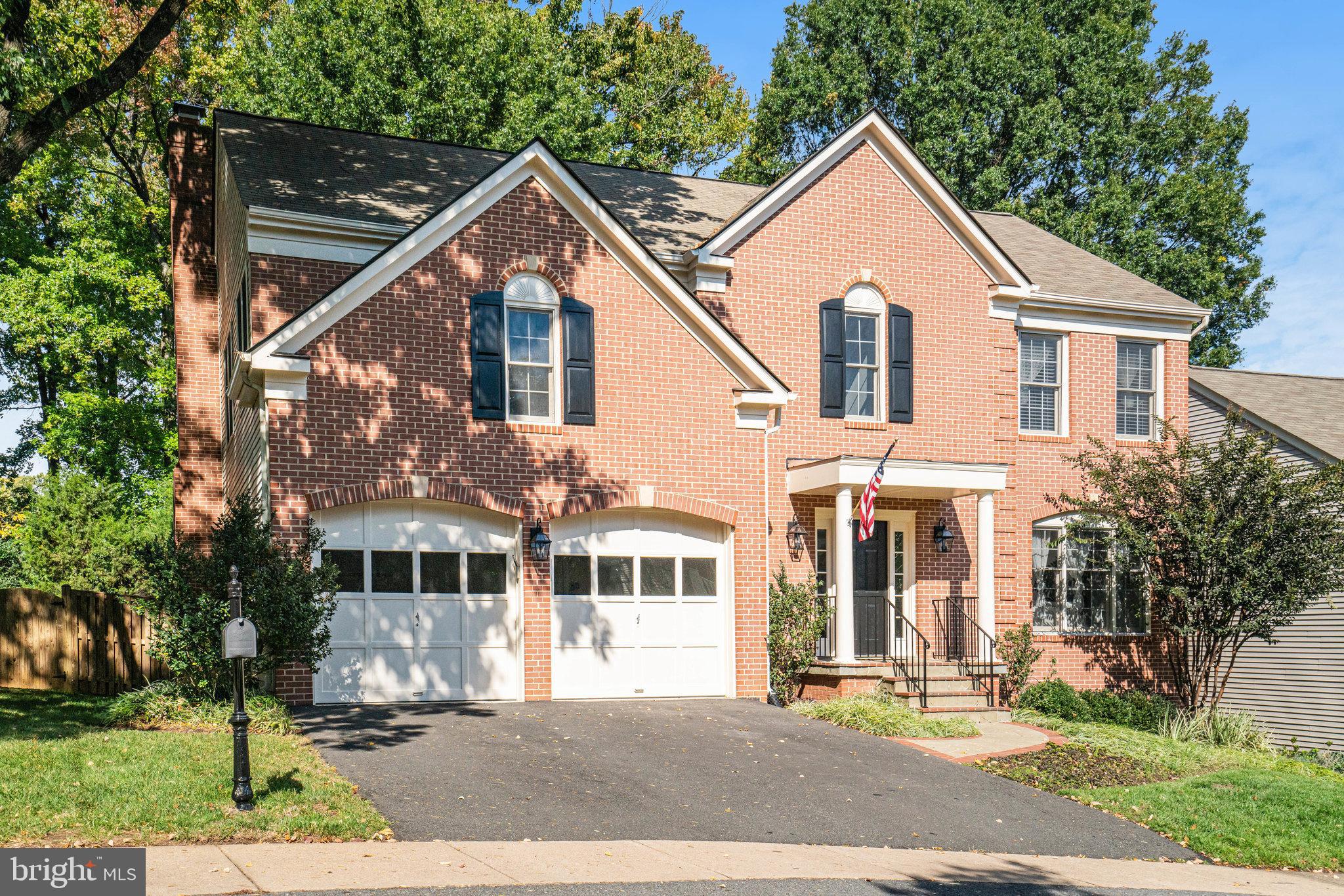 Come home to Quaker Hill! Spacious and updated Colonial with over 4,000 square feet on three finished levels in the heart of Alexandria City. The open-concept main level features hardwood floors, a bright kitchen with high ceilings, stainless steel appliances, island, walk-in pantry and breakfast nook - all overlooking the inviting family room. New French doors lead to a Trex deck and flagstone patio—perfect for entertaining. Upstairs has 4 bedrooms, including a large primary suite with walk-in closet and luxurious bath with tub and shower, plus brand-new carpet throughout. The finished lower level offers a fifth bedroom or home office, full bath, and generous storage space, with walkout access to a fully fenced backyard. Additional highlights include a mudroom with laundry, attached two-car garage, driveway parking, and a playset and trampoline that convey. Convenient to MacArthur Elementary, shopping, dining, Old Town, the Pentagon, and DC.