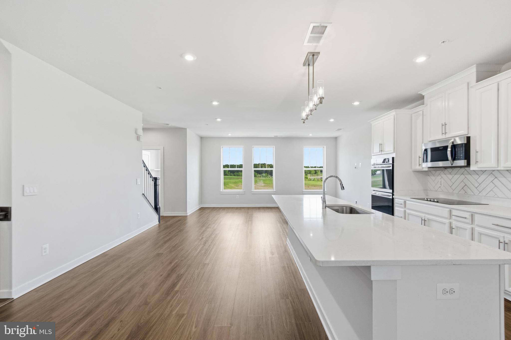 This unit offers the perfect blend of modern comfort and vibrant community living in the heart of Leesburg. This stylish 3-bedroom condo townhouse is ideal for young professionals and couples or Retirees seeking a low-maintenance lifestyle without sacrificing space or sophistication. Enjoy open-concept living, contemporary finishes, and thoughtfully designed spaces perfect for both relaxing and entertaining. Nestled in a welcoming neighborhood, residents benefit from a strong sense of community along with convenient access to shops, dining, commuter routes, and everything Northern Virginia has to offer. Whether you're hosting friends or unwinding after a busy day, this home delivers the lifestyle you've been looking for.