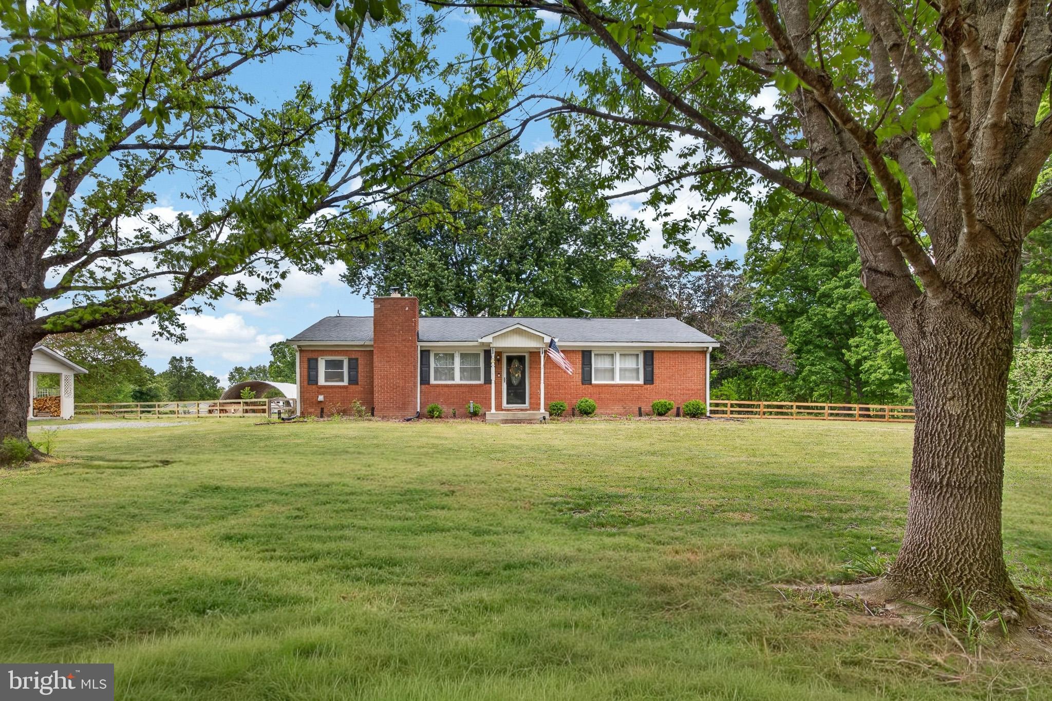 PRICE IMPROVEMENT! Bring your horses home! Experience the perfect harmony of comfort and country living in this beautiful ranch-style retreat, nestled on 8.5 expansive acres. This beautifully maintained corner-plot residence features three spacious bedrooms and two full bathrooms, centered around an inviting open floor plan that seamlessly connects the living and dining areas. The heart of the home invites you to cozy up by the wood-burning fireplace or prepare meals in an upgraded kitchen equipped with elegant countertops and energy-efficient appliances. Peace of mind comes standard with significant recent mechanical upgrades, including a new well pump and a new HVAC unit installed in 2024, new house gutters 2025.

The property includes a three-stall coverall, three separate pastures—all with water access. A level grass riding area is ready for training, while the dedicated horse area features a tankless water heater to provide both hot and cold water for summer bathing. The property has a dual well system, allowing your horses to benefit from their own dedicated well with a double-filtration system. Extensive hardscaping and a charming gazebo offer the perfect vantage point for guests to watch you ride or to simply soak in the breathtaking pasture views.
The 16ftx37ft out-building has two separate rooms, currently used as a tack room and the larger area is used as a workshop / woodworking room with it's own electric supply.  The new (2025) custom-built 8ftx12ft shed is insulated and has power and water supply making it a functional and useful addition.

Lake Anna state park is just 6 miles away; enjoy year round riding with 12 miles of trails and swim in the lake with your horse! Not only do you have easy access to trail riding, but for all the competitors HITS Commonwealth Park Culpeper is just 25 minutes away.

While you'll feel worlds away in your private haven, you remain perfectly positioned for commuting and culture. The property is located just 35 minutes from Fredericksburg, 60 minutes from both Richmond and Charlottesville, and 90 minutes from Washington, D.C. Embrace the lifestyle you’ve always dreamed of and bring your horses home!