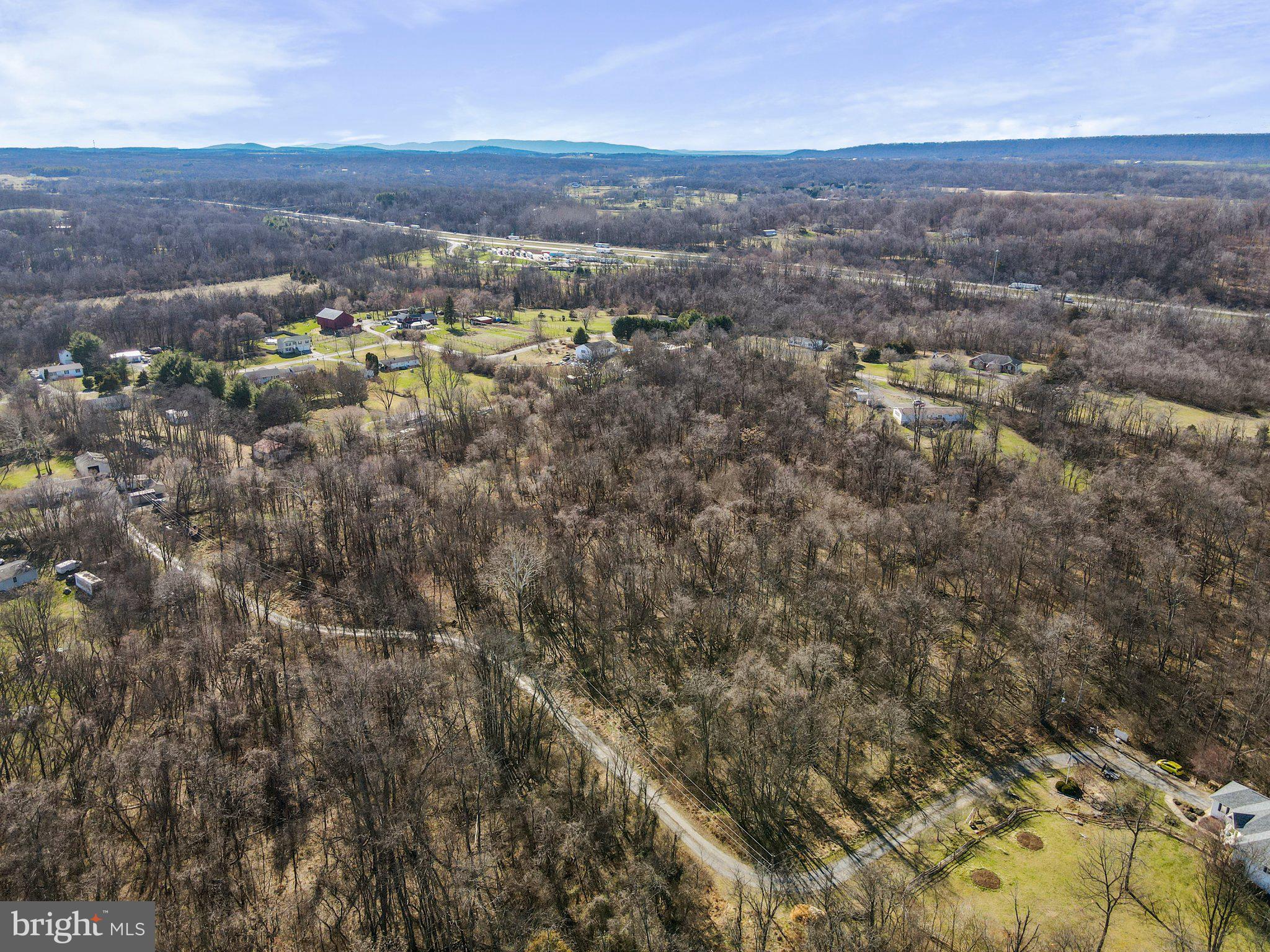 Two Acre Building Lot in South Berkeley County! Wooded & Private, with a shared Right of Way Lane to access the property. Close commuting routes to Winchester VA, Martinsburg & Charles Town WV. If you are looking for a place to build your home, this is it! Call For Details!