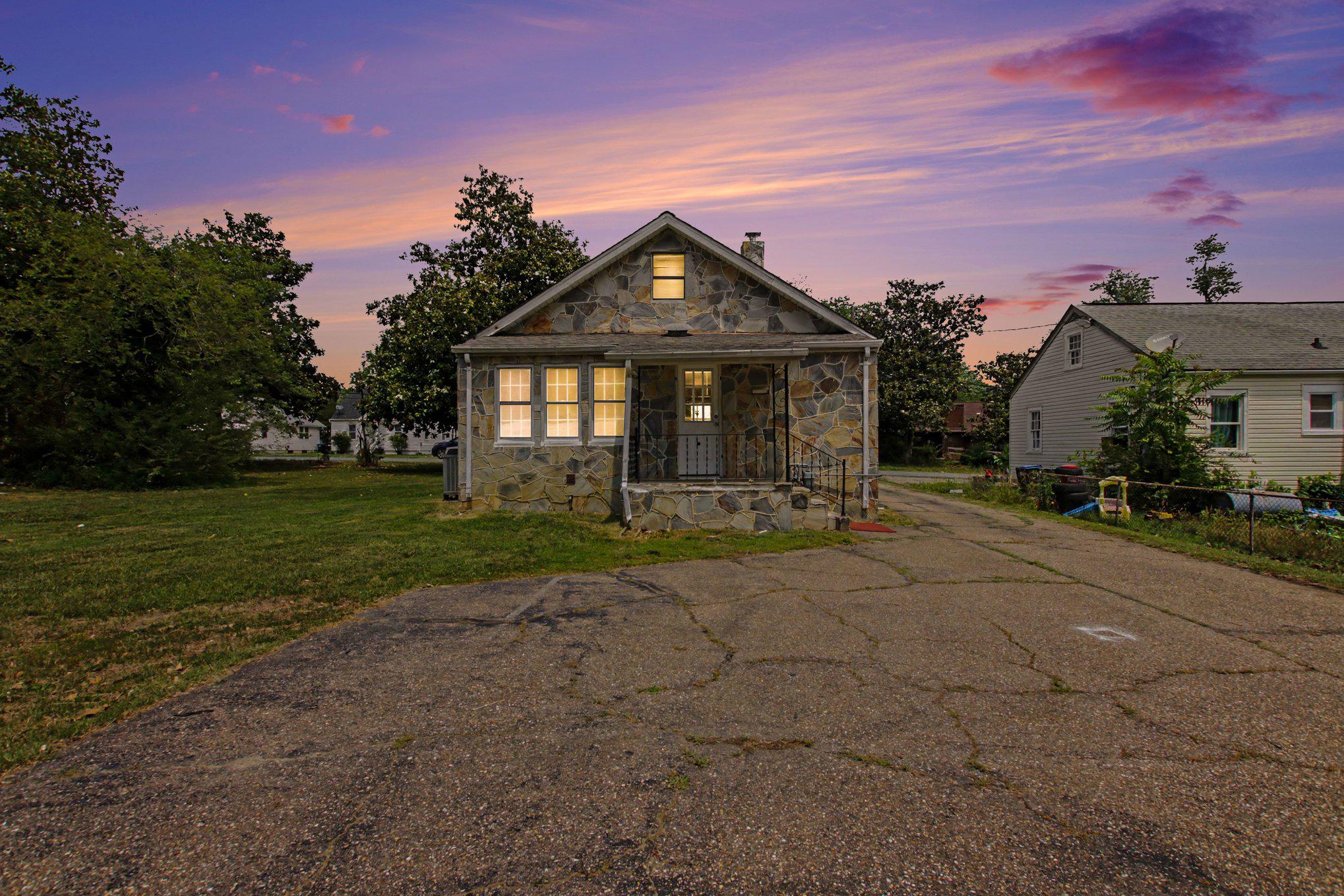 This charming 2-bedroom, 1-bathroom bungalow in Courtland Heights presents a compelling investment opportunity or quaint family home. Built in 1949, the property features a traditional floor plan that maximizes space and functionality. The interior boasts an attic for additional storage and an unfinished basement. Oversized detached garage provides ample parking and storage options. This property is positioned for strong rental returns. Its strategic location and solid structural features make it an excellent addition to any investment portfolio, promising both immediate cash flow and long-term appreciation potential. Property is being sold as-is.