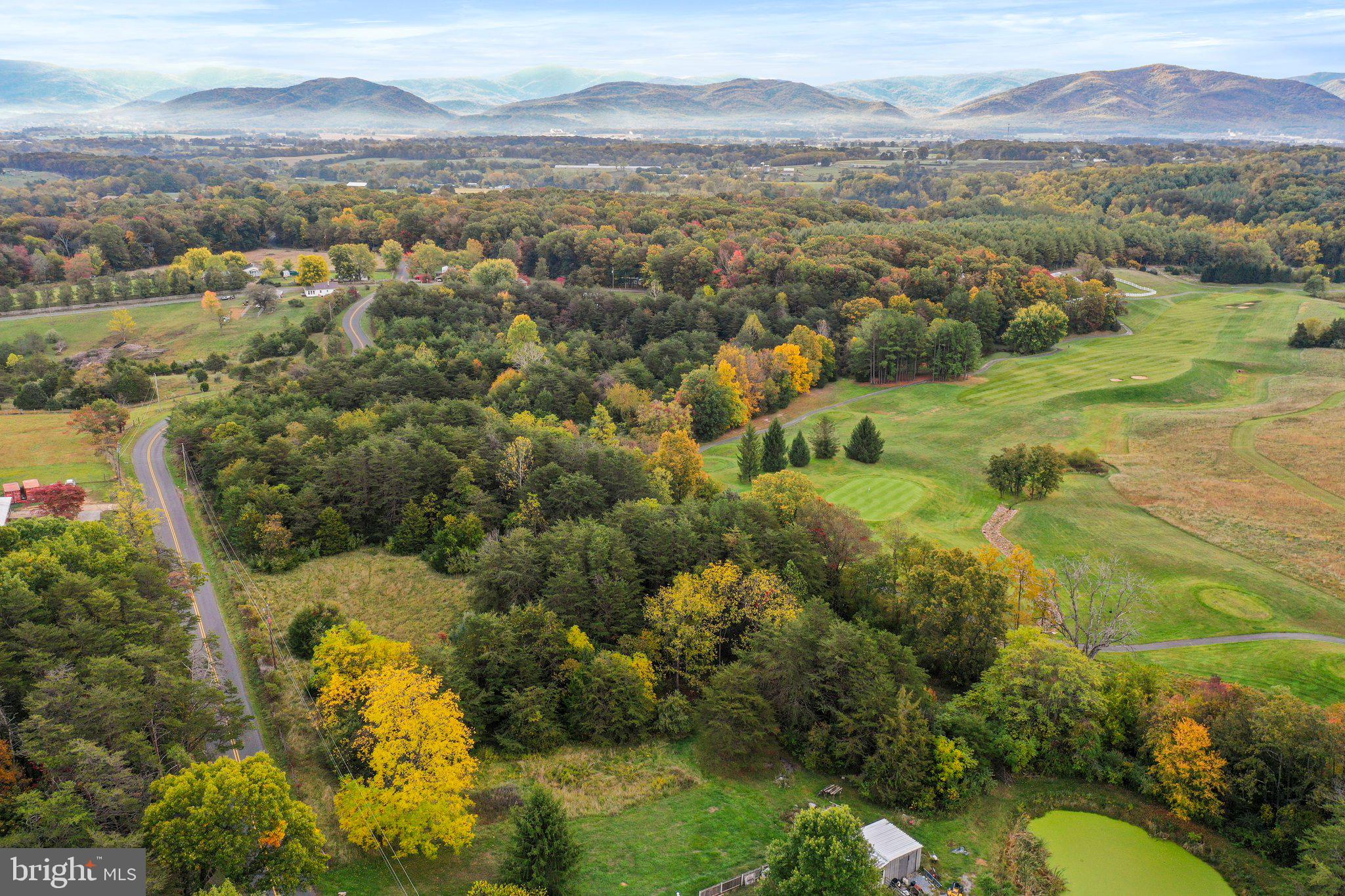Build your dream home on 7.59 acres adjoining Woodstone Meadows Golf Course overlooking the 11th hole. 
State maintained road.  
Subdividable 
Owners are willing to sell an additional acre (7.59 has already been surveyed)
Please see plat for proposed Entrance and Drainfield