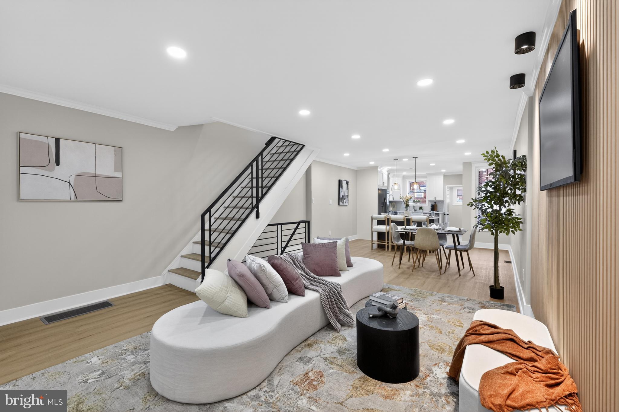 Back on the Market.
Welcome to 7164 N 19th Street, Philadelphia, PA 19126 — a beautifully renovated home offering modern luxury, spacious living, and exceptional versatility. This stunning property features 4 spacious bedrooms and 3 fully updated bathrooms, thoughtfully designed with comfort and style in mind.

Step inside to an open-concept main level filled with natural light, showcasing beautiful countertops, stainless steel appliances, and a modern kitchen perfect for entertaining and everyday living. The seamless flow between the kitchen, dining, and living areas creates a warm and inviting atmosphere.

The second level offers 3 spacious bedrooms, including a luxurious primary suite featuring a private full bathroom and ample closet space. The fully finished walk-out basement provides incredible additional living space with its own private entrance, featuring a spacious living area, a 4th bedroom, and a full bathroom — ideal for guests, extended family, a home office, gym, or entertainment area.

Enjoy outdoor living on the rear deck, perfect for family BBQs or relaxing with your morning coffee, along with the convenience of a garage. Every detail of this home has been thoughtfully updated, offering true move-in-ready convenience in the desirable West Oak Lane neighborhood of Philadelphia.

Don’t miss the opportunity to own this exceptional renovated home featuring modern finishes, flexible living space, and premium upgrades throughout.