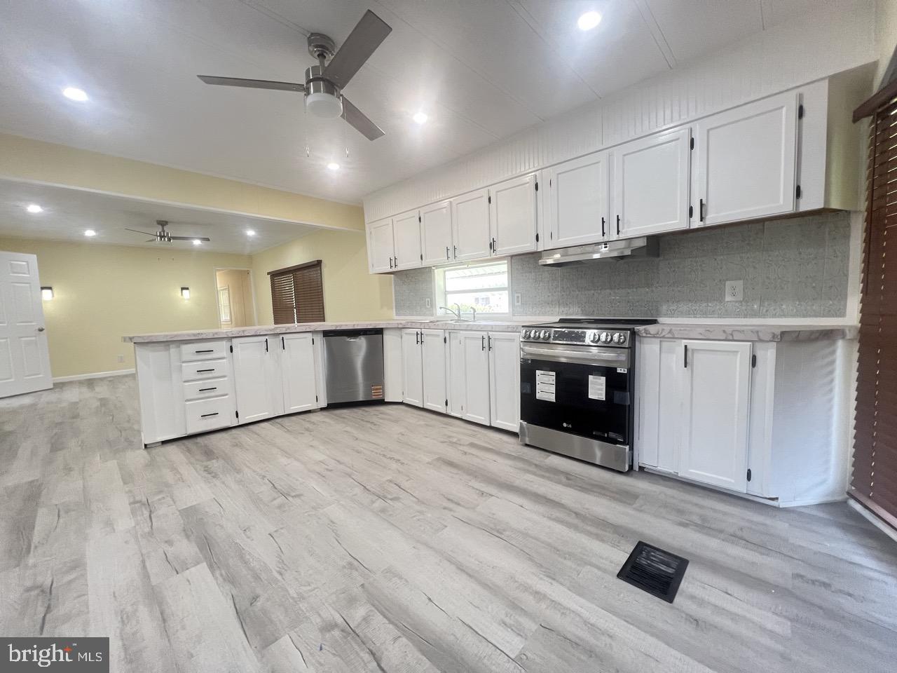 Very Nicely remodeled manufactured home.  3 bedrooms with an oversized Bathroom.  Great Location with paved roads all the way to the driveway parking.